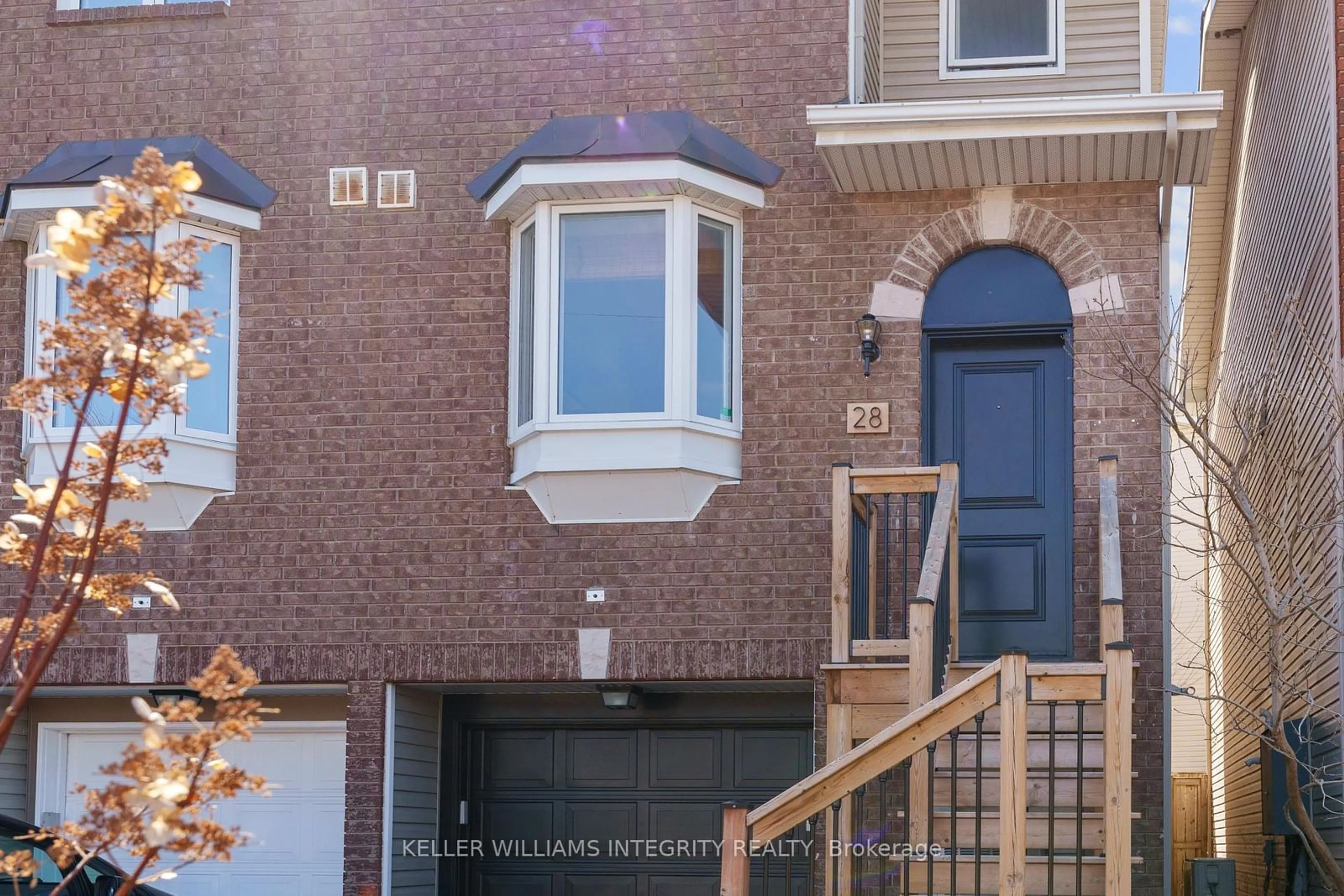 Home with brick exterior material, street for 28 Hintonburg Pl, Ottawa Ontario K1Y 4W6