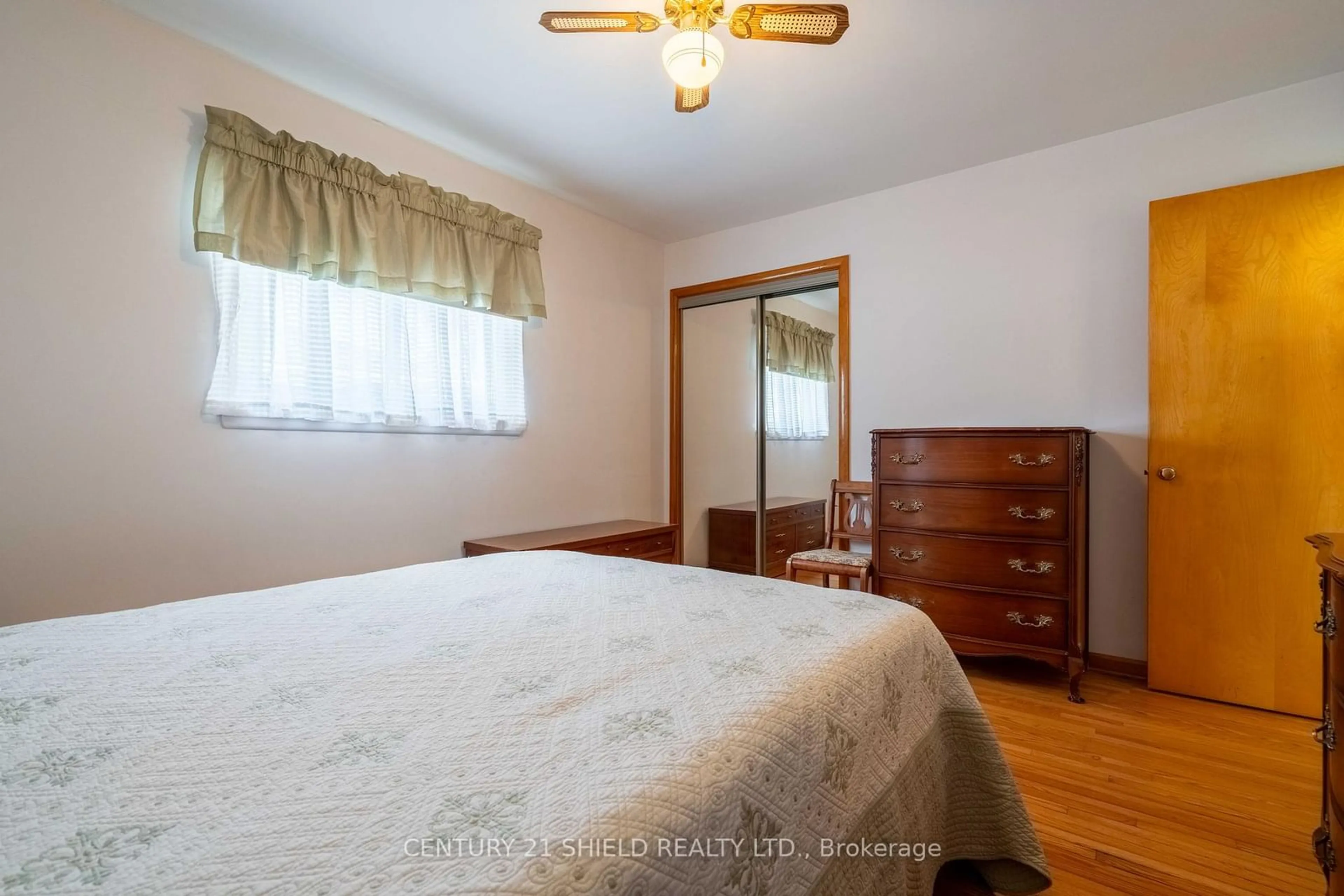 Bedroom with bed, wood/laminate floor for 506 Anderson Dr, Cornwall Ontario K6H 5N3