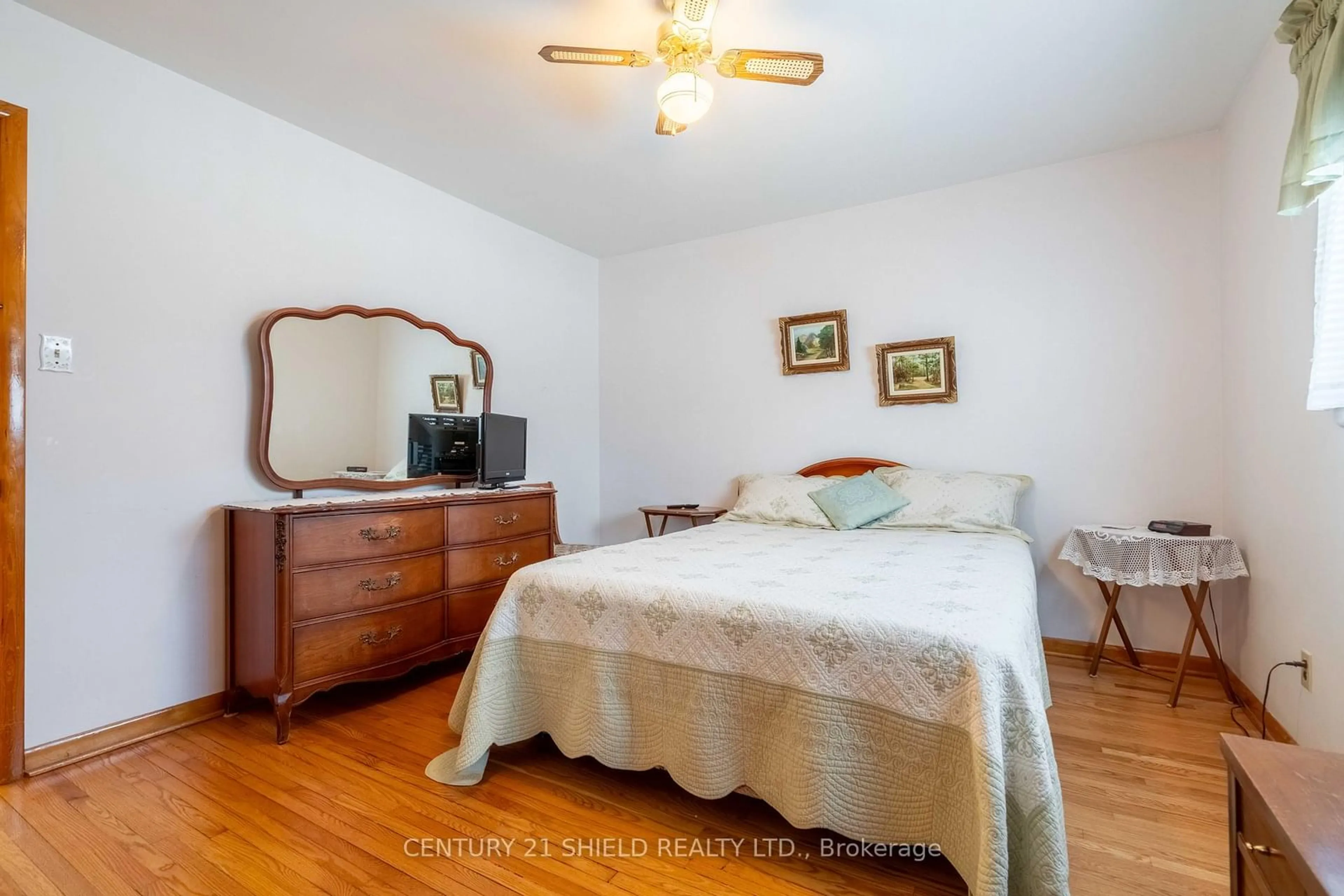 Bedroom with bed, wood/laminate floor for 506 Anderson Dr, Cornwall Ontario K6H 5N3