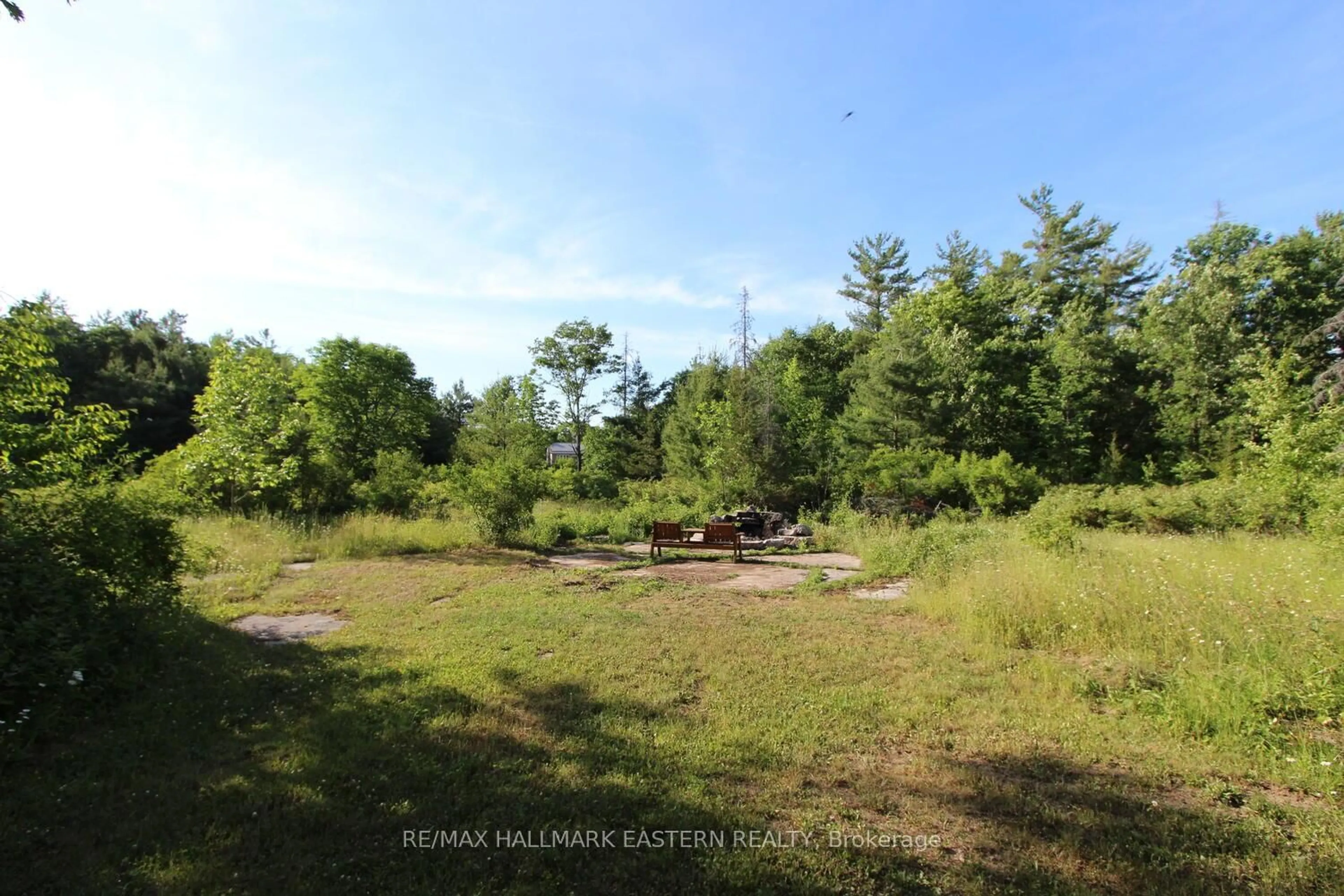 A pic from outside/outdoor area/front of a property/back of a property/a pic from drone, forest/trees view for 42 Maple Rd, Limoges Ontario K0K 2M0