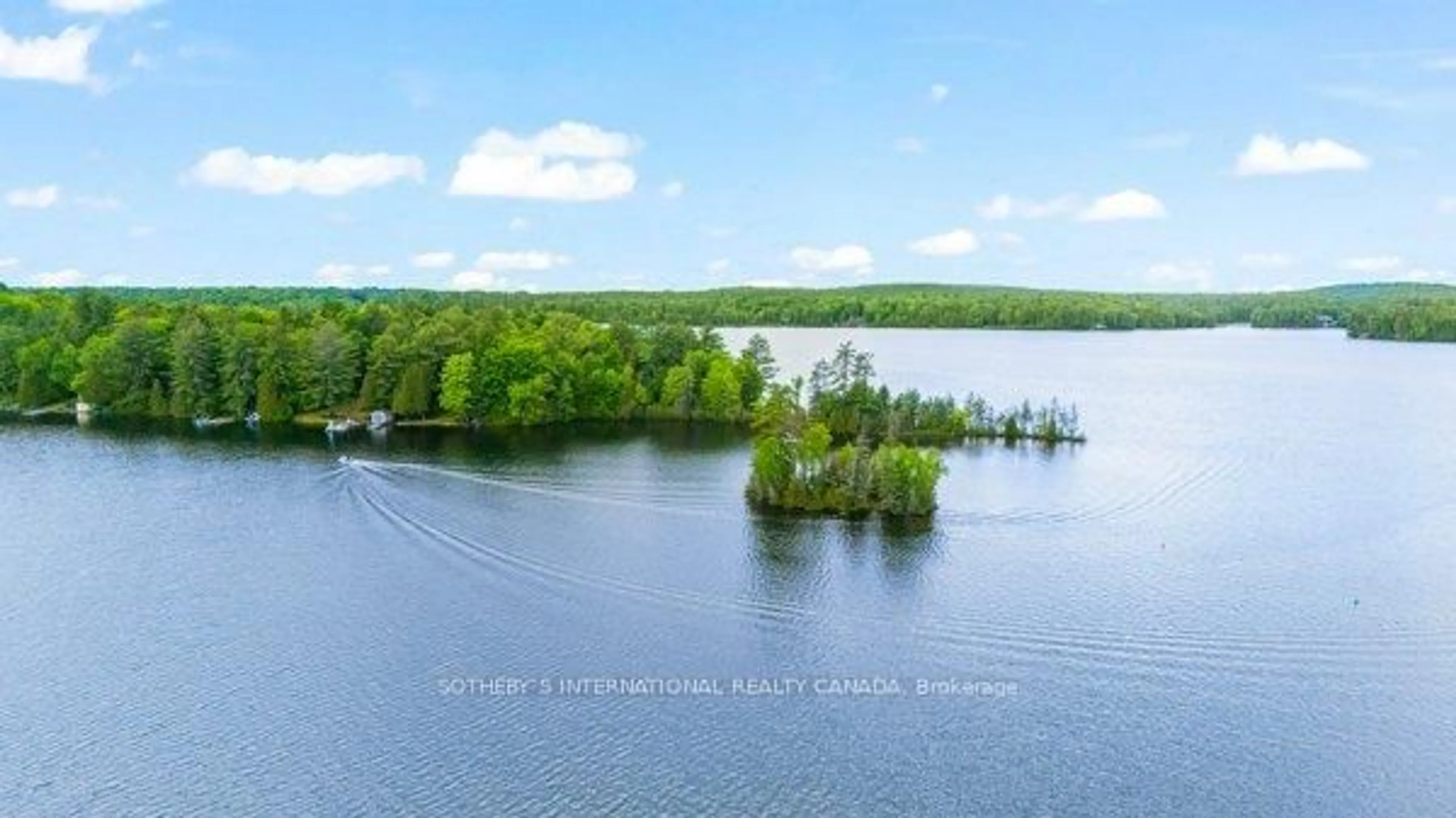 A pic from outside/outdoor area/front of a property/back of a property/a pic from drone, water/lake/river/ocean view for 1827 Crystal Lake Rd, Trent Lakes Ontario K0M 2A0