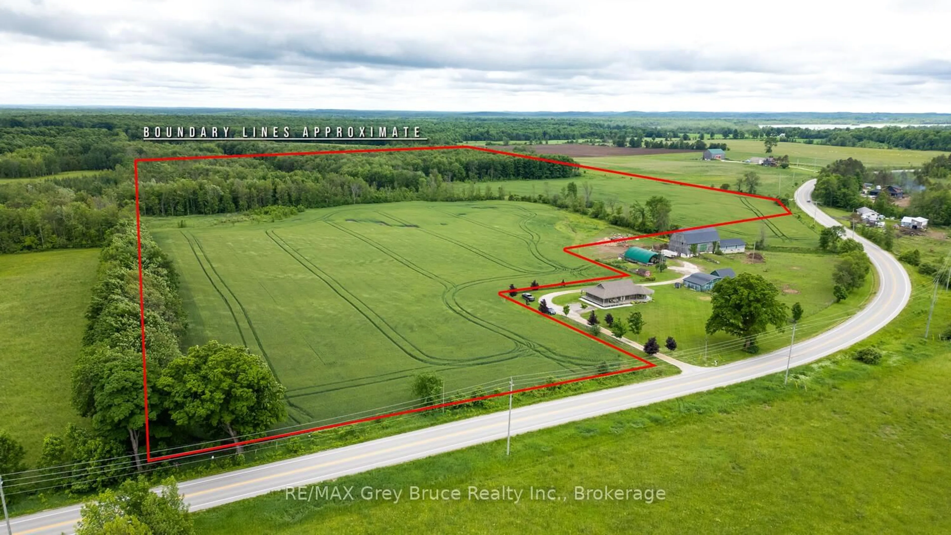 A pic from outside/outdoor area/front of a property/back of a property/a pic from drone, water/lake/river/ocean view for 402622 Grey 17 Rd, Georgian Bluffs Ontario N0H 2T0