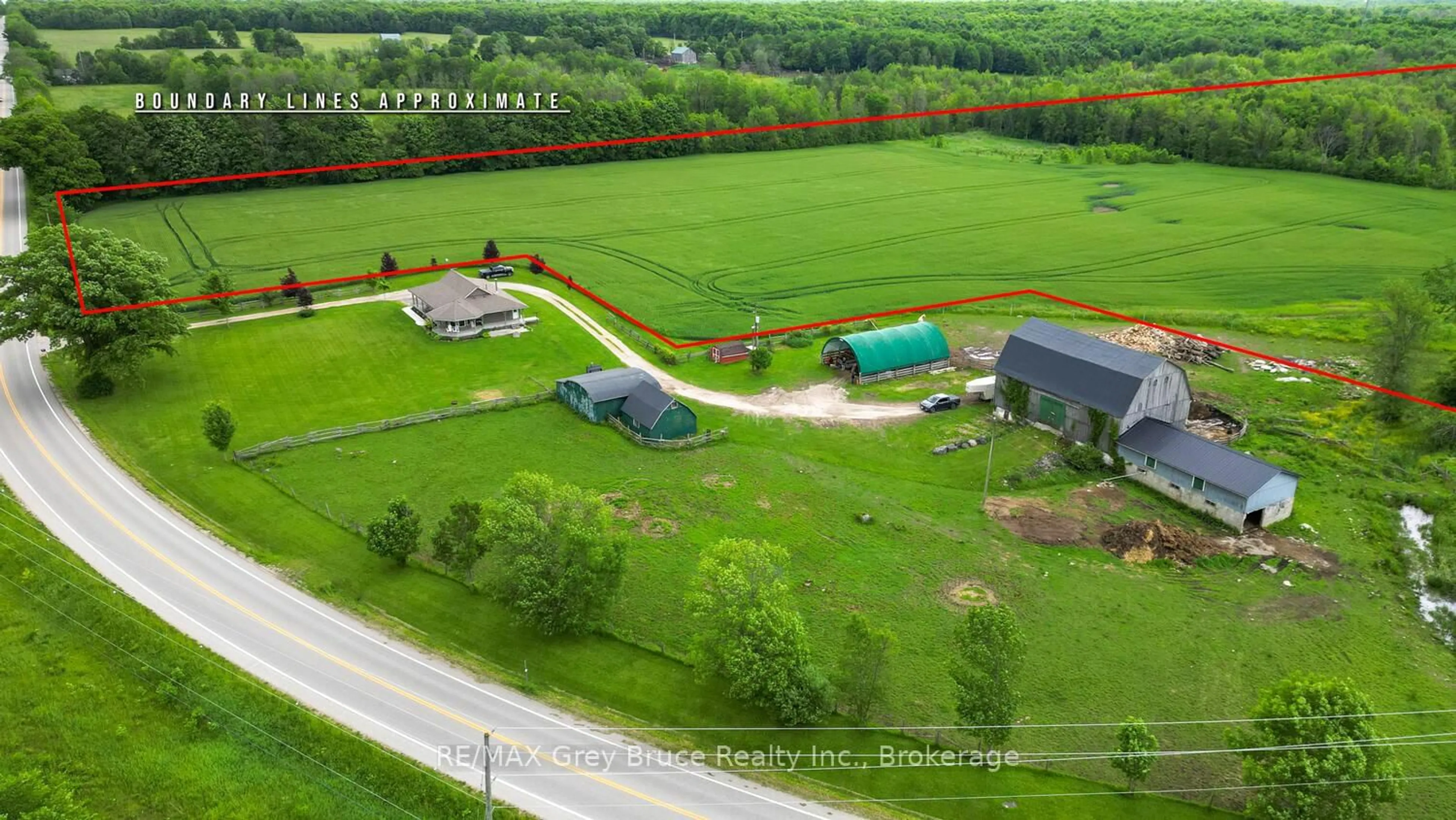 A pic from outside/outdoor area/front of a property/back of a property/a pic from drone, unknown for 402622 Grey 17 Rd, Georgian Bluffs Ontario N0H 2T0