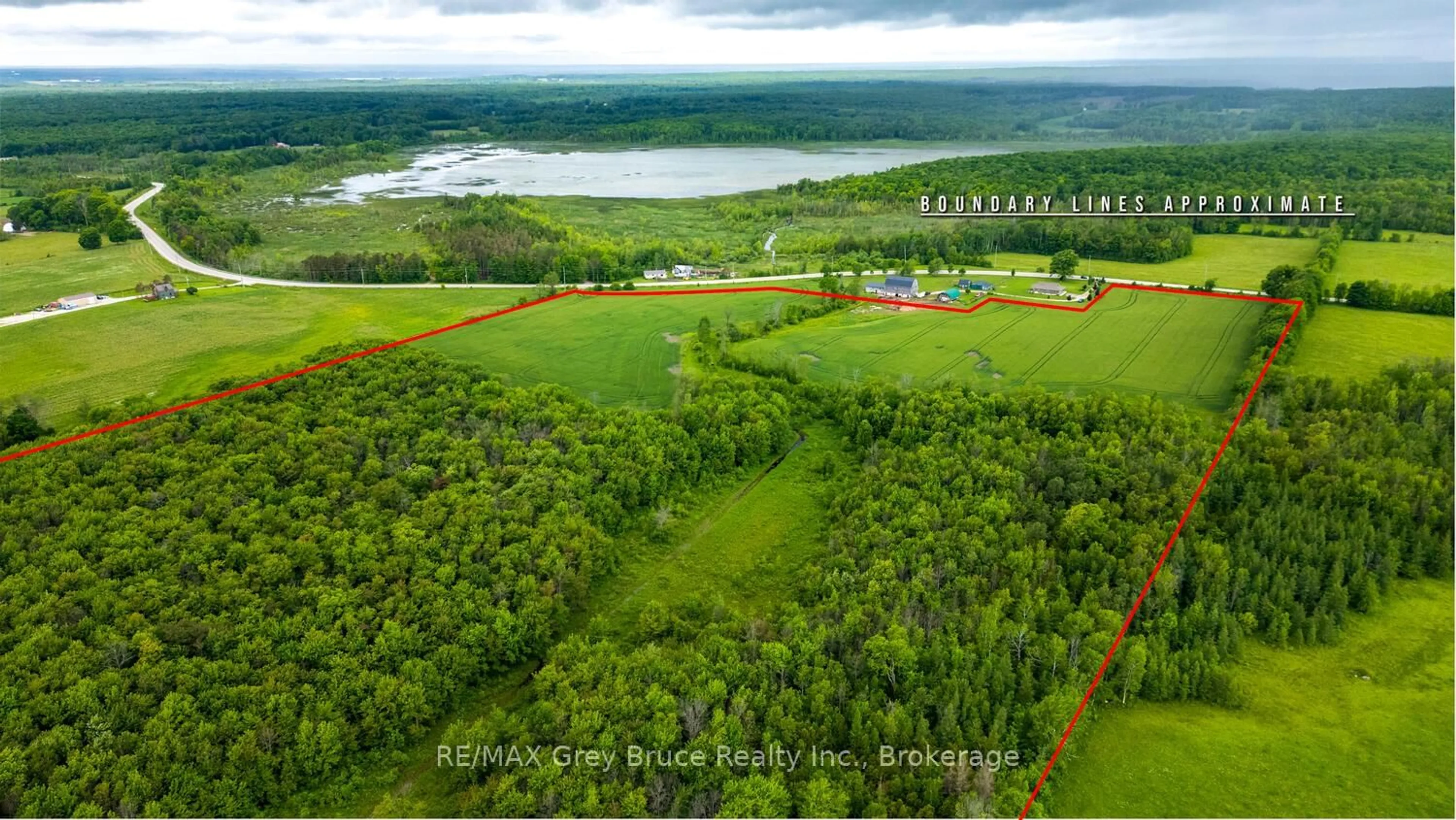 A pic from outside/outdoor area/front of a property/back of a property/a pic from drone, water/lake/river/ocean view for 402622 Grey 17 Rd, Georgian Bluffs Ontario N0H 2T0
