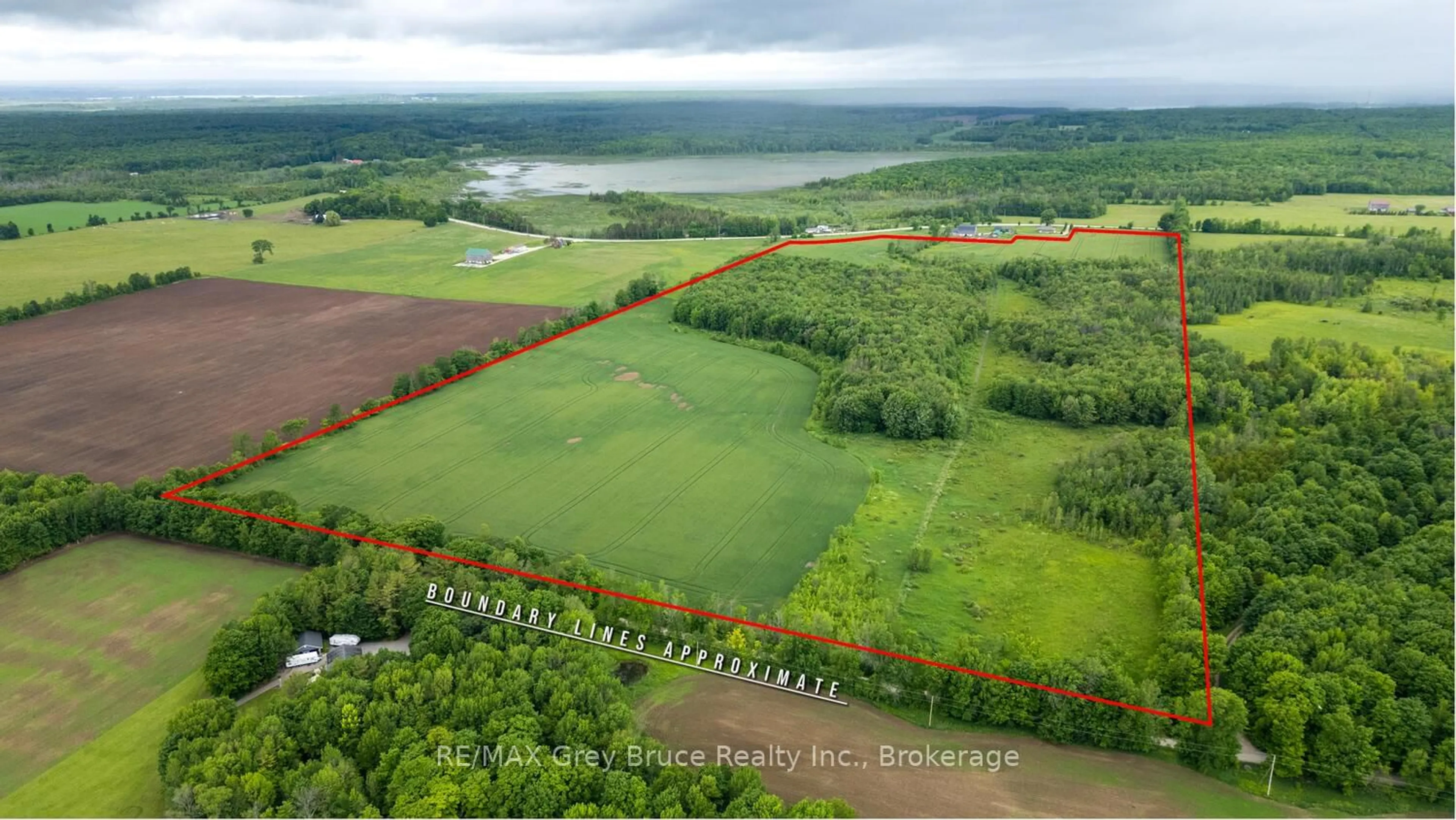 A pic from outside/outdoor area/front of a property/back of a property/a pic from drone, water/lake/river/ocean view for 402622 Grey 17 Rd, Georgian Bluffs Ontario N0H 2T0