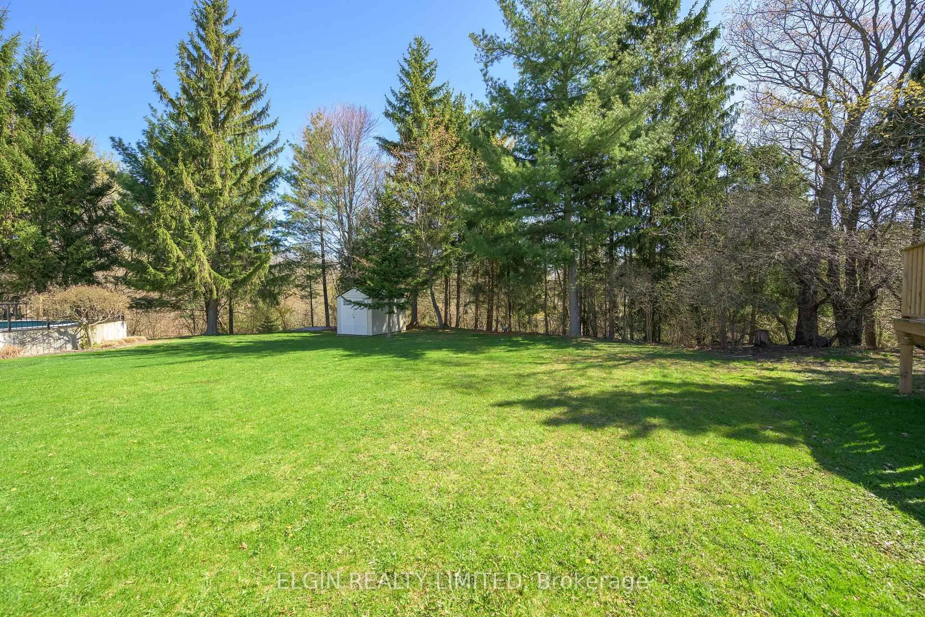 A pic from outside/outdoor area/front of a property/back of a property/a pic from drone, forest/trees view for 13 Warbler Hts, St. Thomas Ontario N5R 6J4