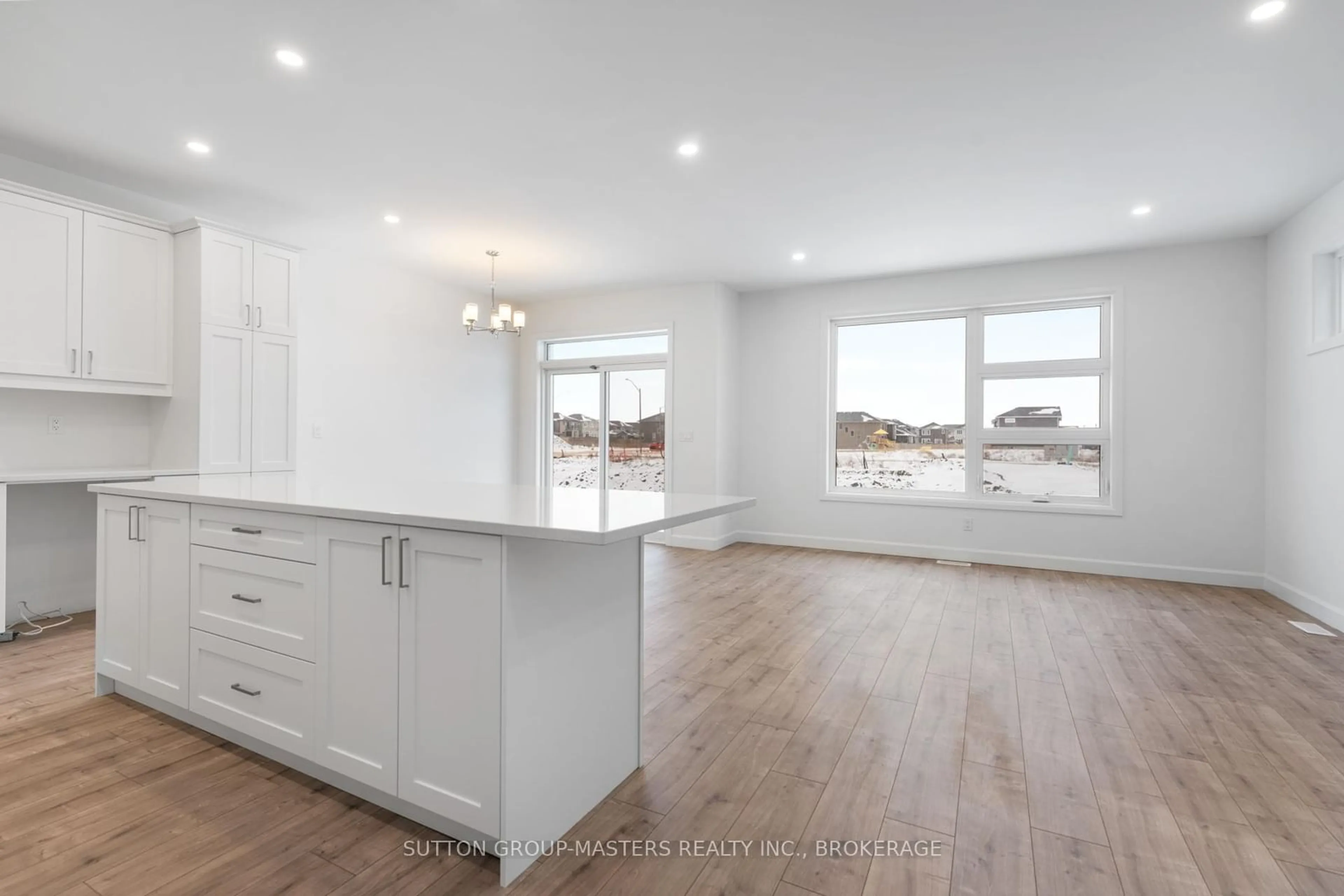 Open concept kitchen, wood/laminate floor for 205 Superior Dr, Loyalist Ontario K7N 0E9