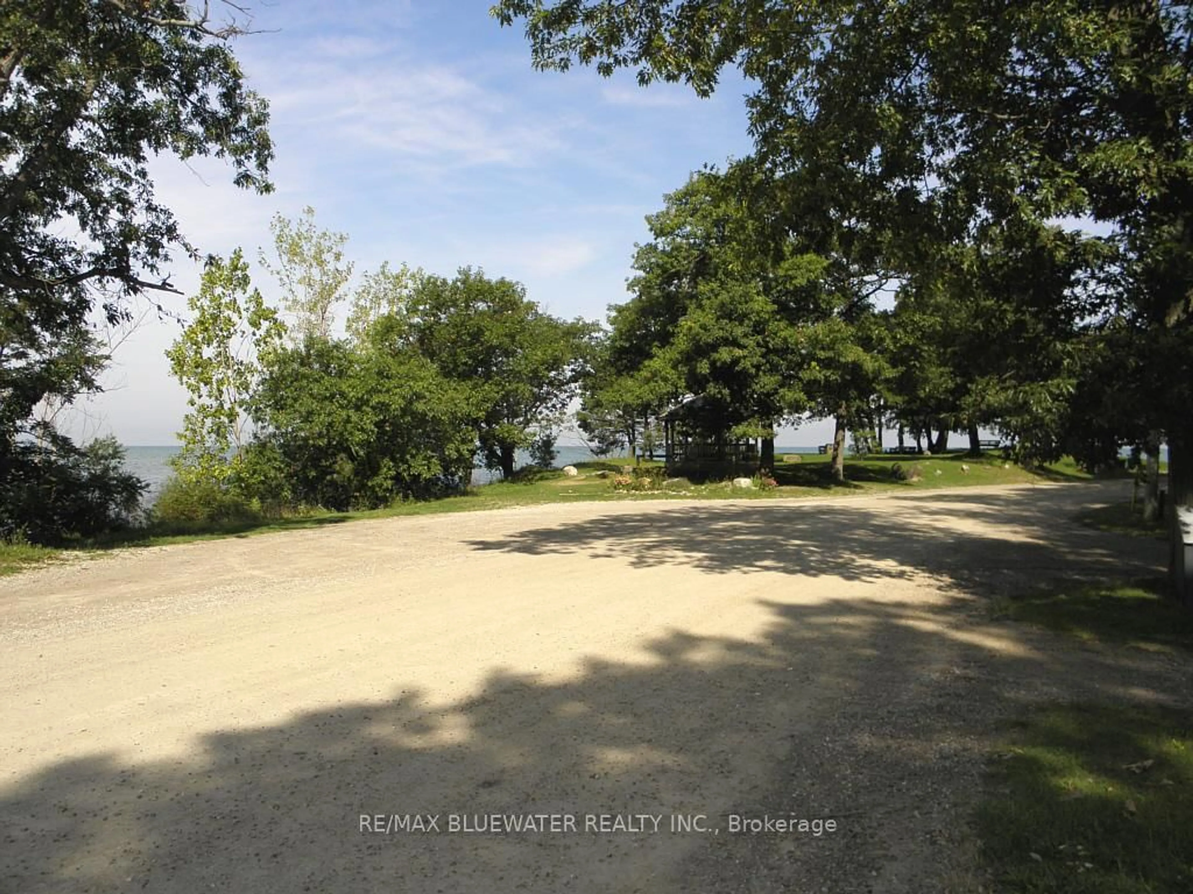 A pic from outside/outdoor area/front of a property/back of a property/a pic from drone, water/lake/river/ocean view for 9714 Lake Rd, Lambton Shores Ontario N0N 1J1