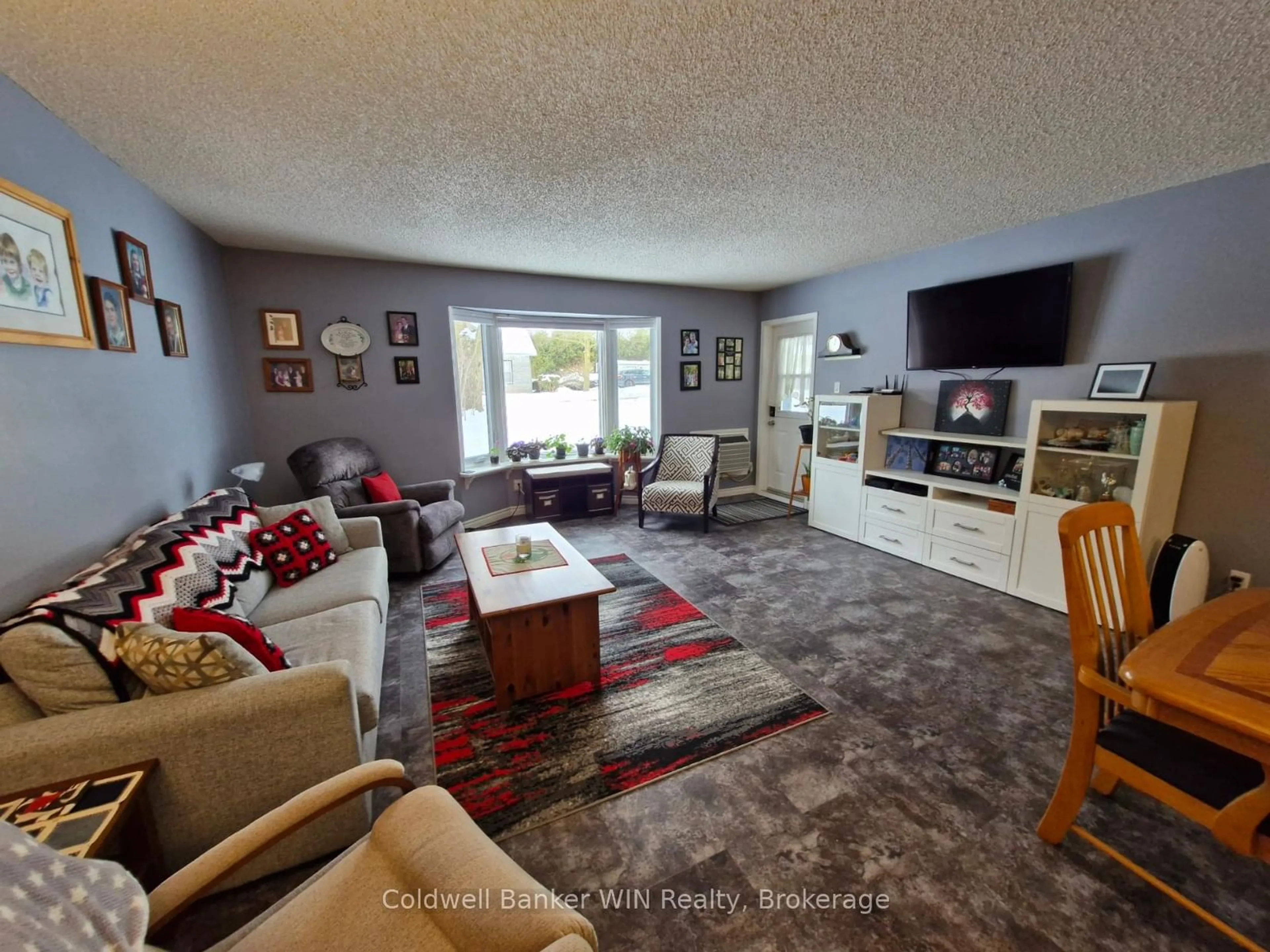 Living room with furniture, unknown for 460 Durham St #106, Wellington North Ontario N0G 2L1