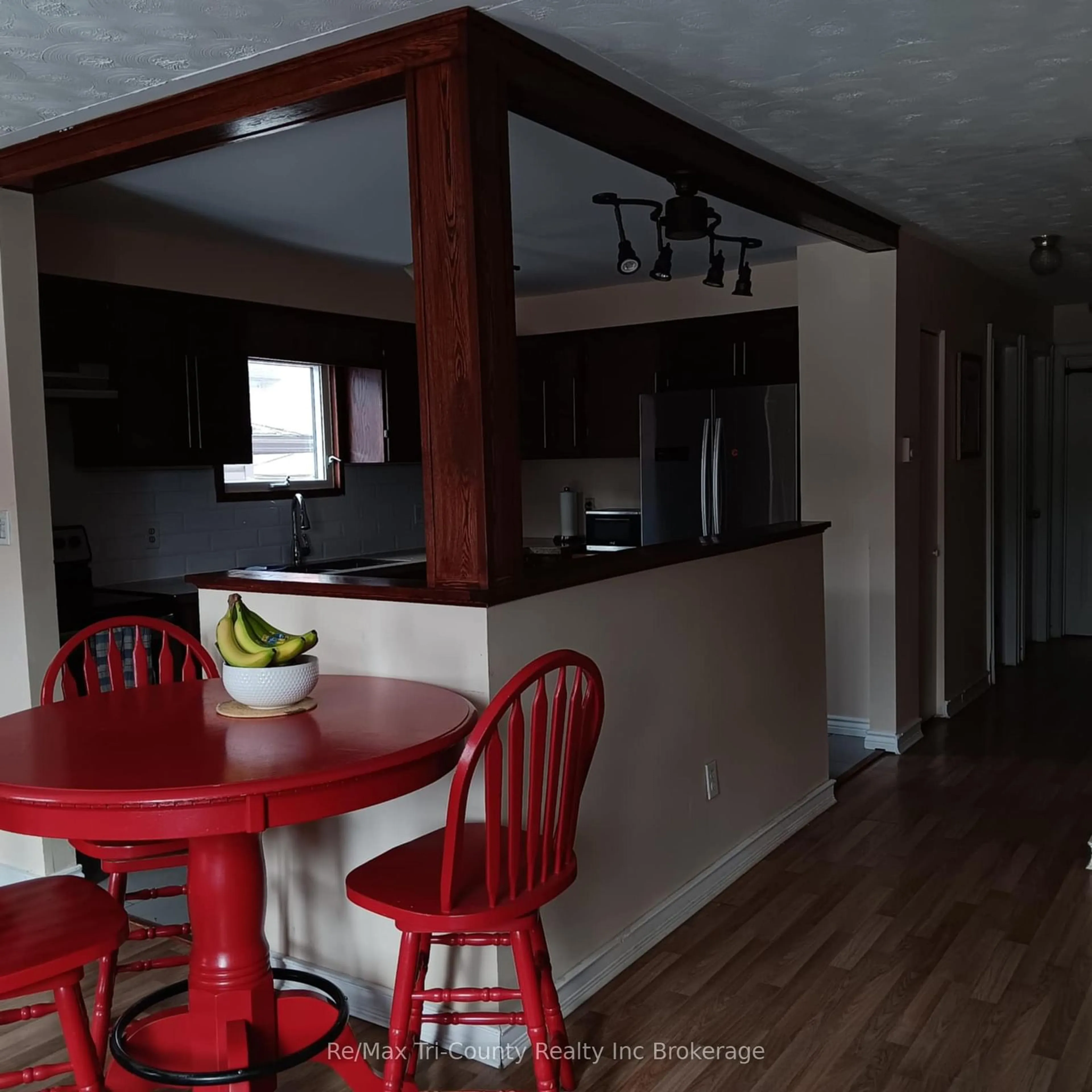 Open concept kitchen, wood/laminate floor for 19 Belleview Cres, North Bay Ontario P1B 8V2