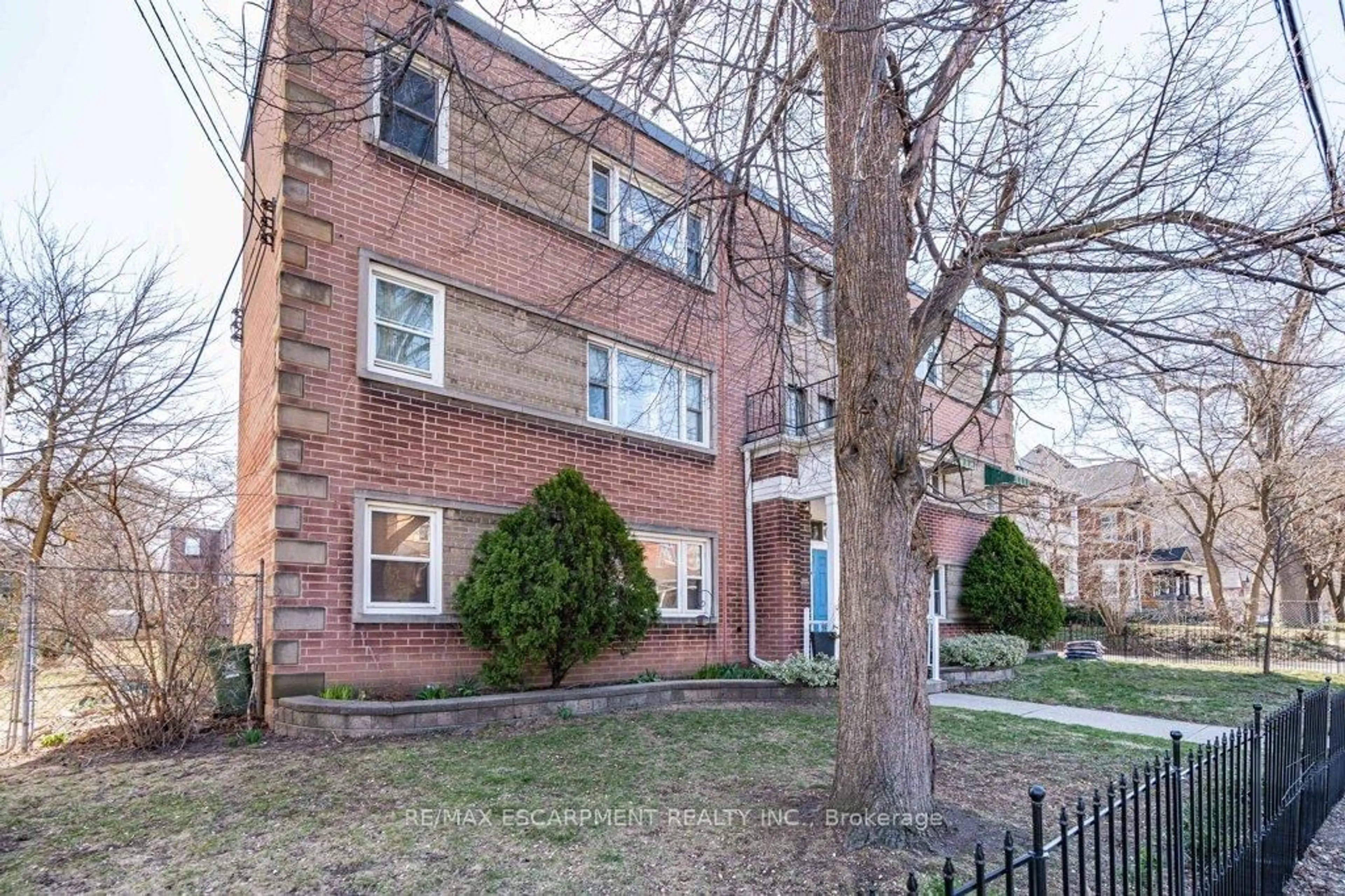 Home with brick exterior material, street for 137 Emerald St #5, Hamilton Ontario L8N 2V4
