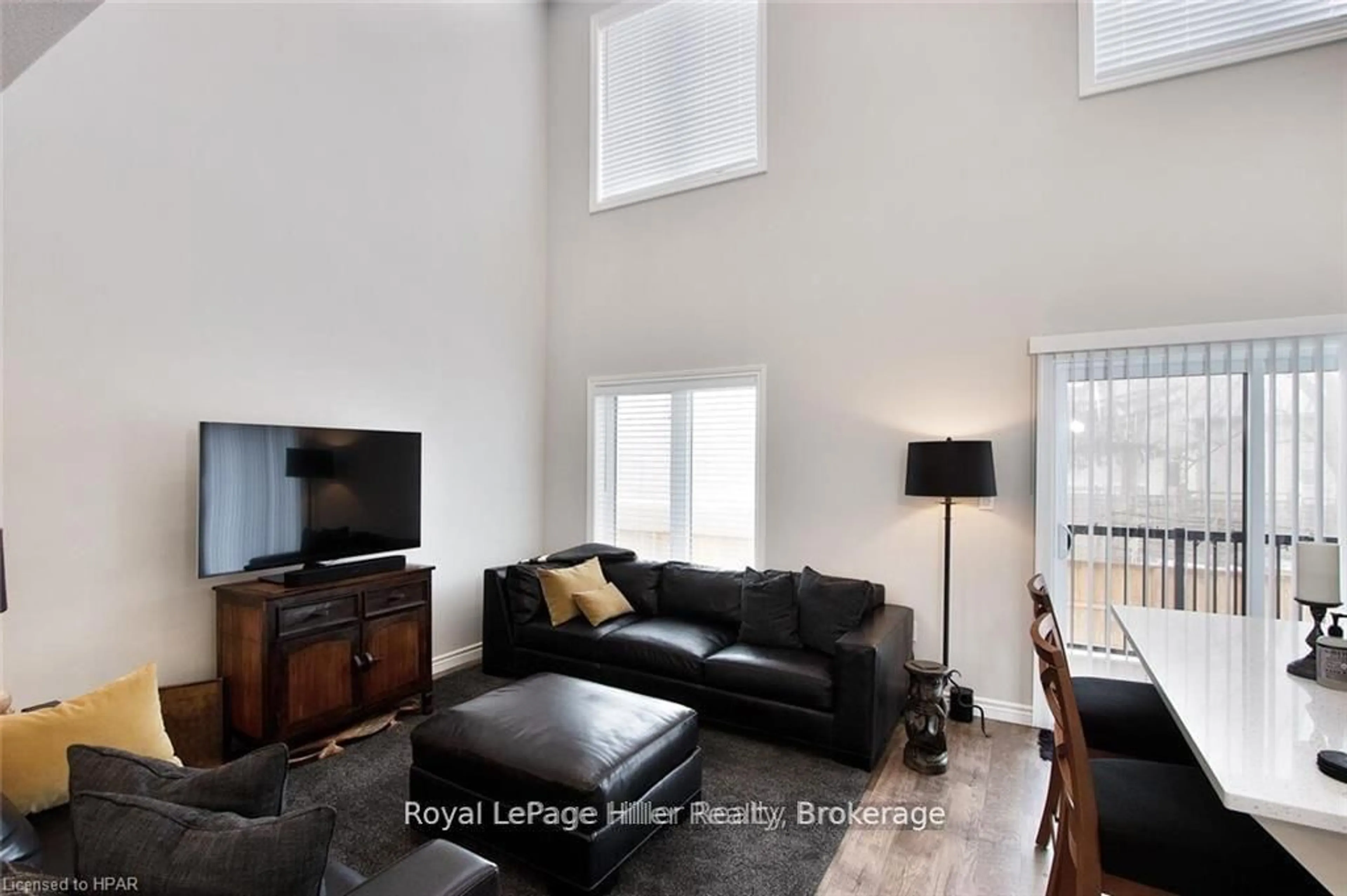 Living room with furniture, wood/laminate floor for 3194 VIVIAN LINE 37 Line #9, Stratford Ontario N5A 0J8