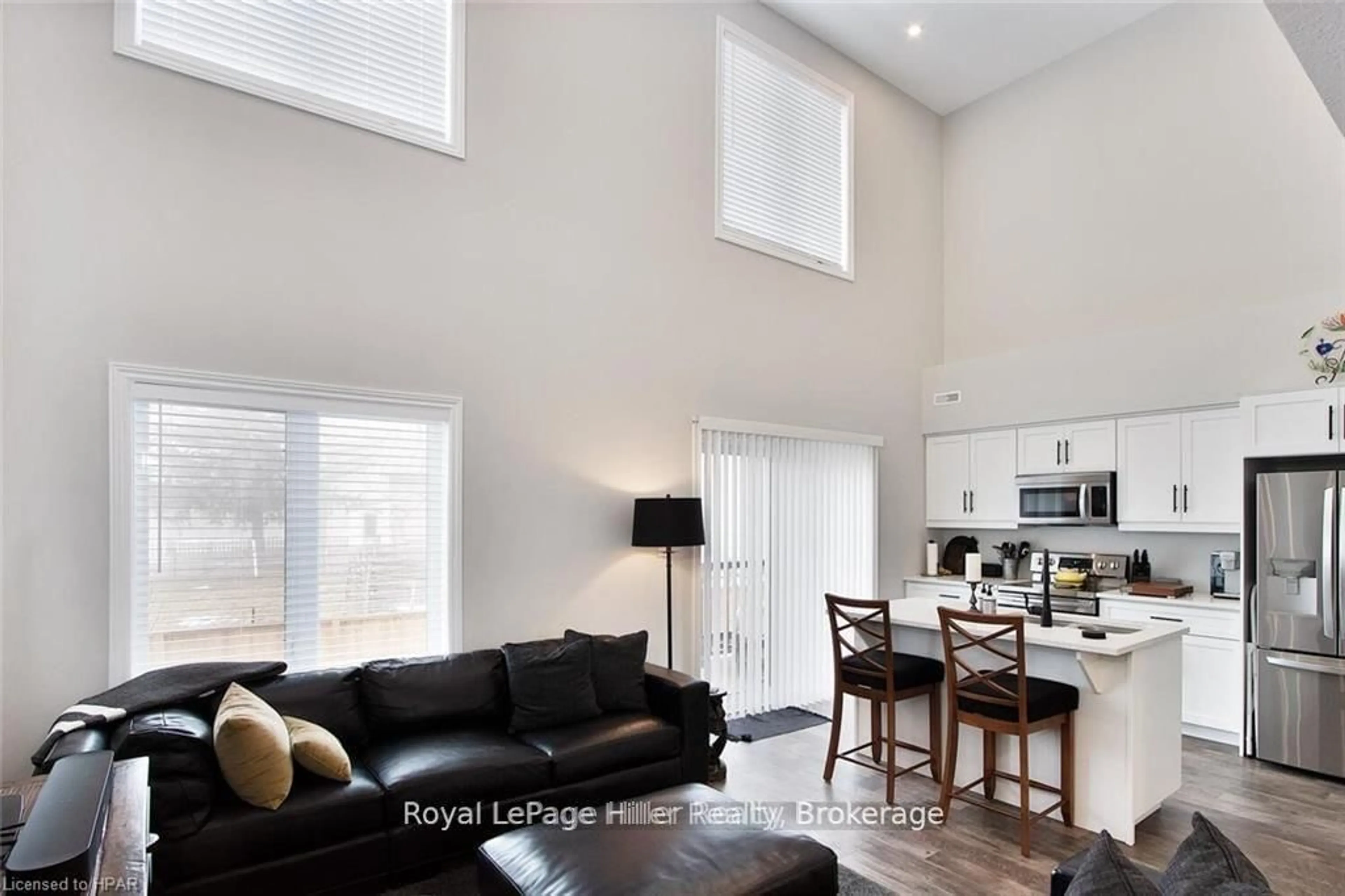 Living room with furniture, wood/laminate floor for 3194 VIVIAN LINE 37 Line #9, Stratford Ontario N5A 0J8