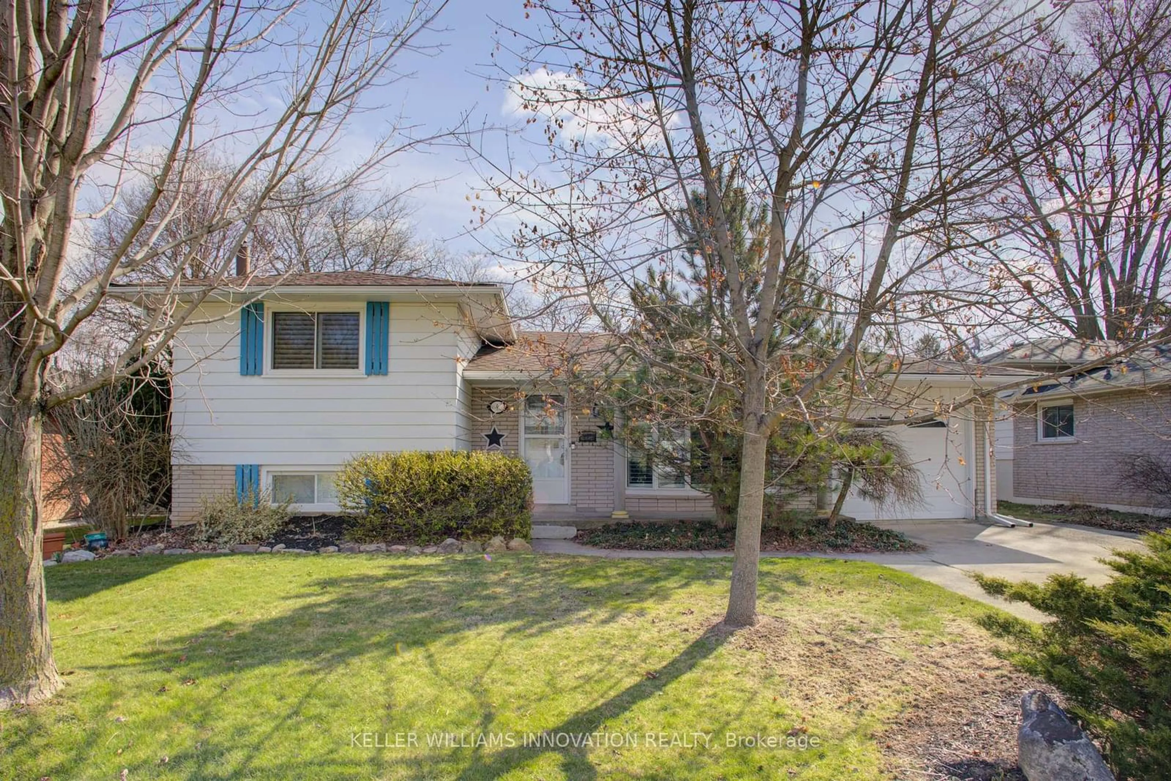 Home with vinyl exterior material, street for 9 Orchard Ave, Hamilton Ontario L9H 4A1