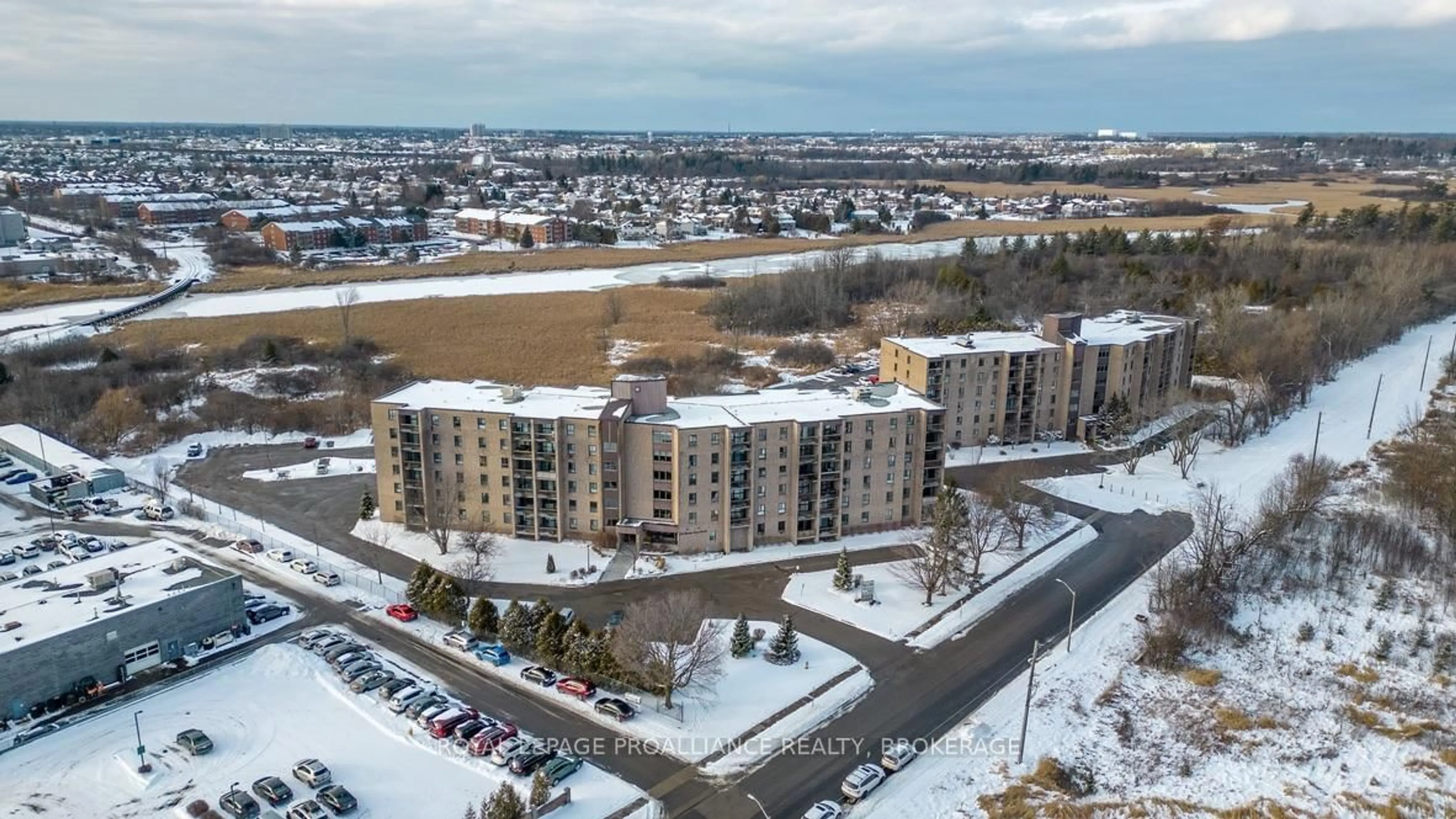A pic from outside/outdoor area/front of a property/back of a property/a pic from drone, unknown for 334 Queen Mary Rd #412, Kingston Ontario K7M 7E7