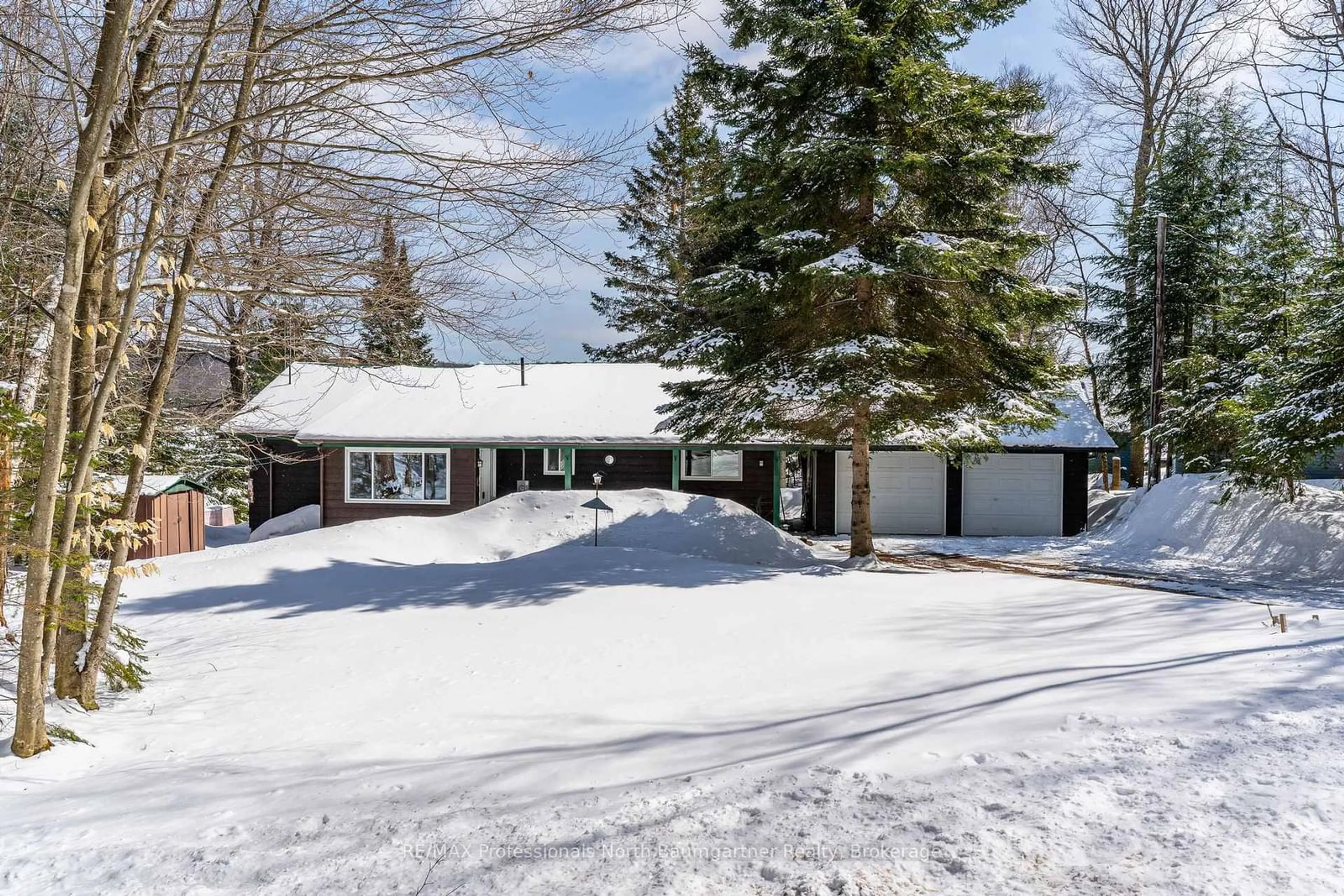A pic from outside/outdoor area/front of a property/back of a property/a pic from drone, street for 6258 Haliburton Lake Rd, Dysart et al Ontario K0M 1S0