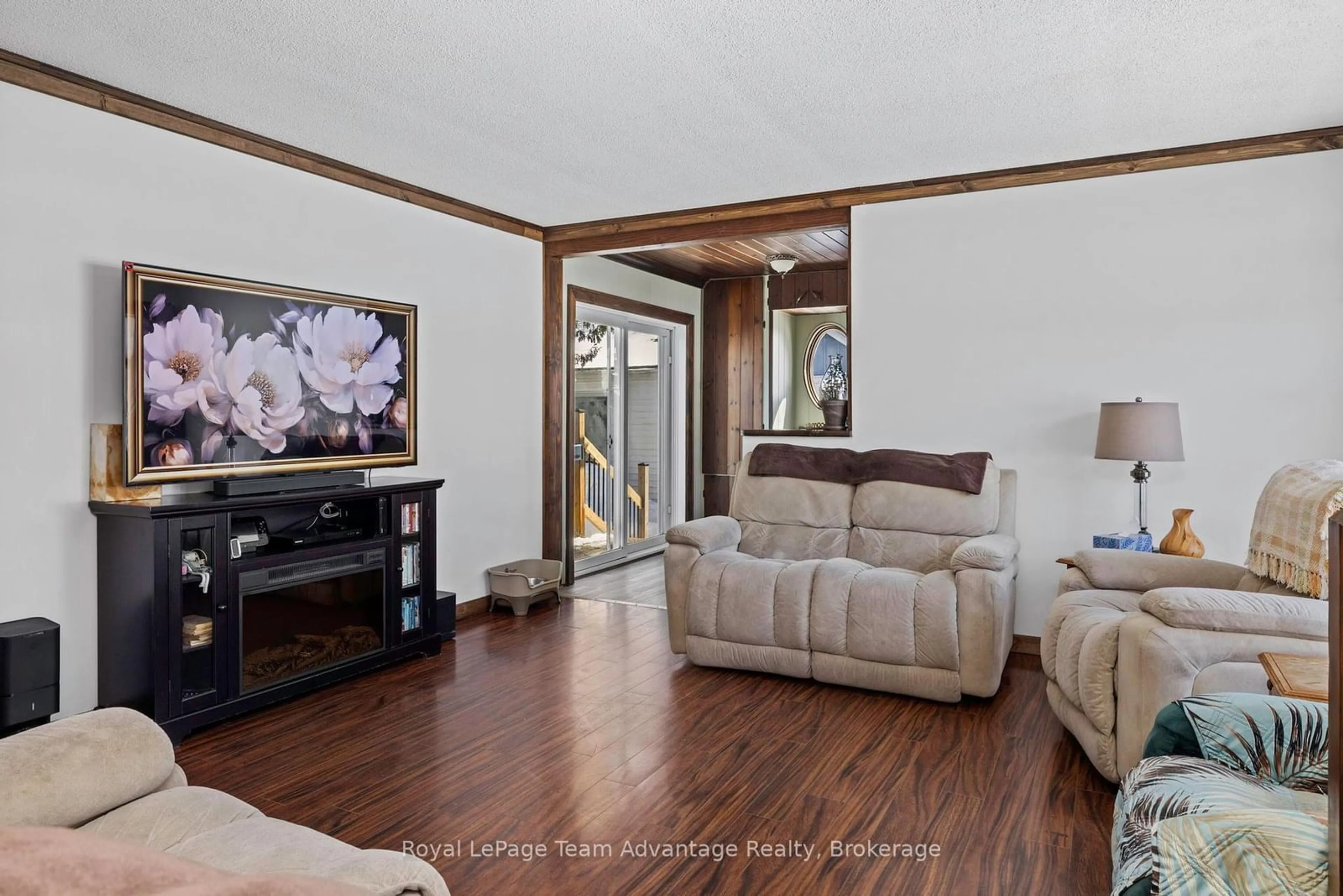 Living room with furniture, wood/laminate floor for 296 High St, Georgian Bay Ontario P0C 1H0