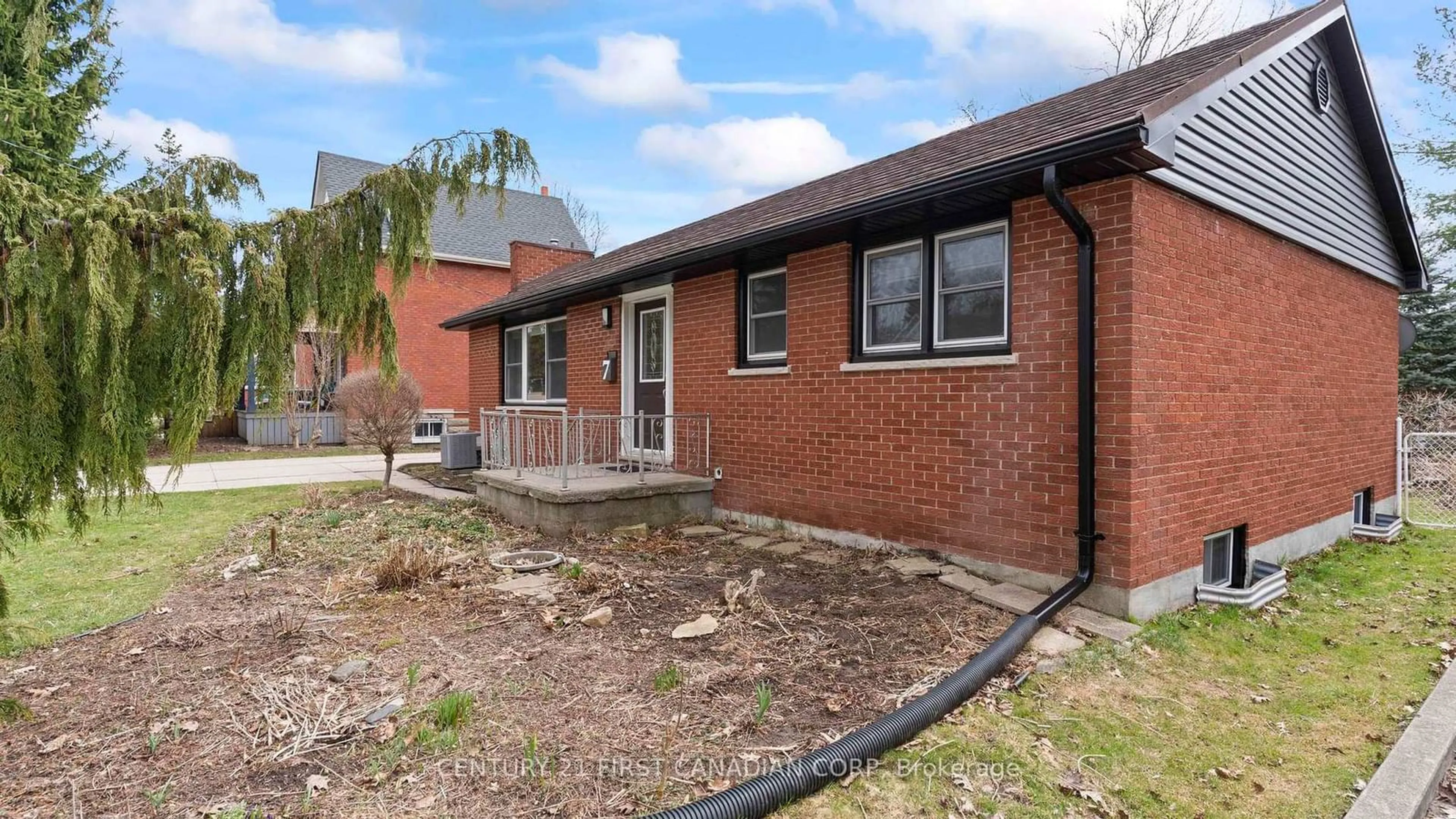 Home with brick exterior material, street for 7 Cedar St, St. Thomas Ontario N5R 1M4