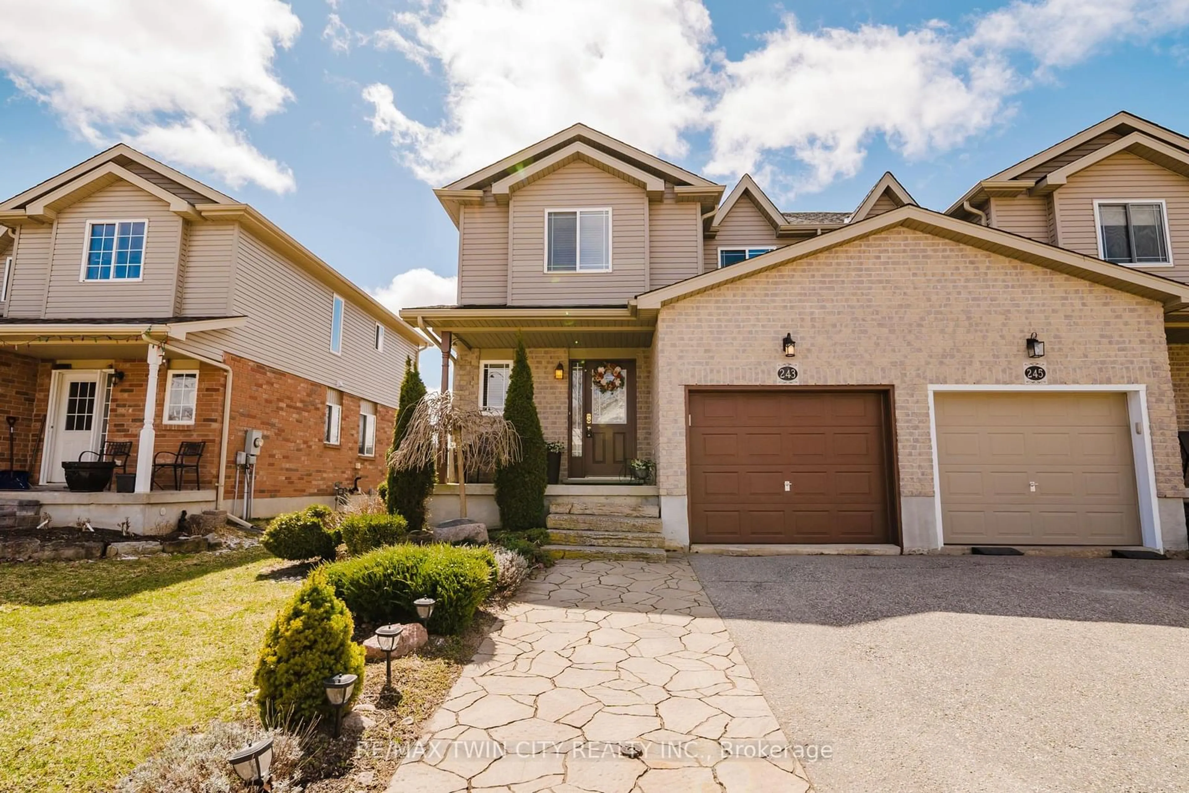Home with brick exterior material, street for 243 Brenneman Dr, Wilmot Ontario N3A 4N2