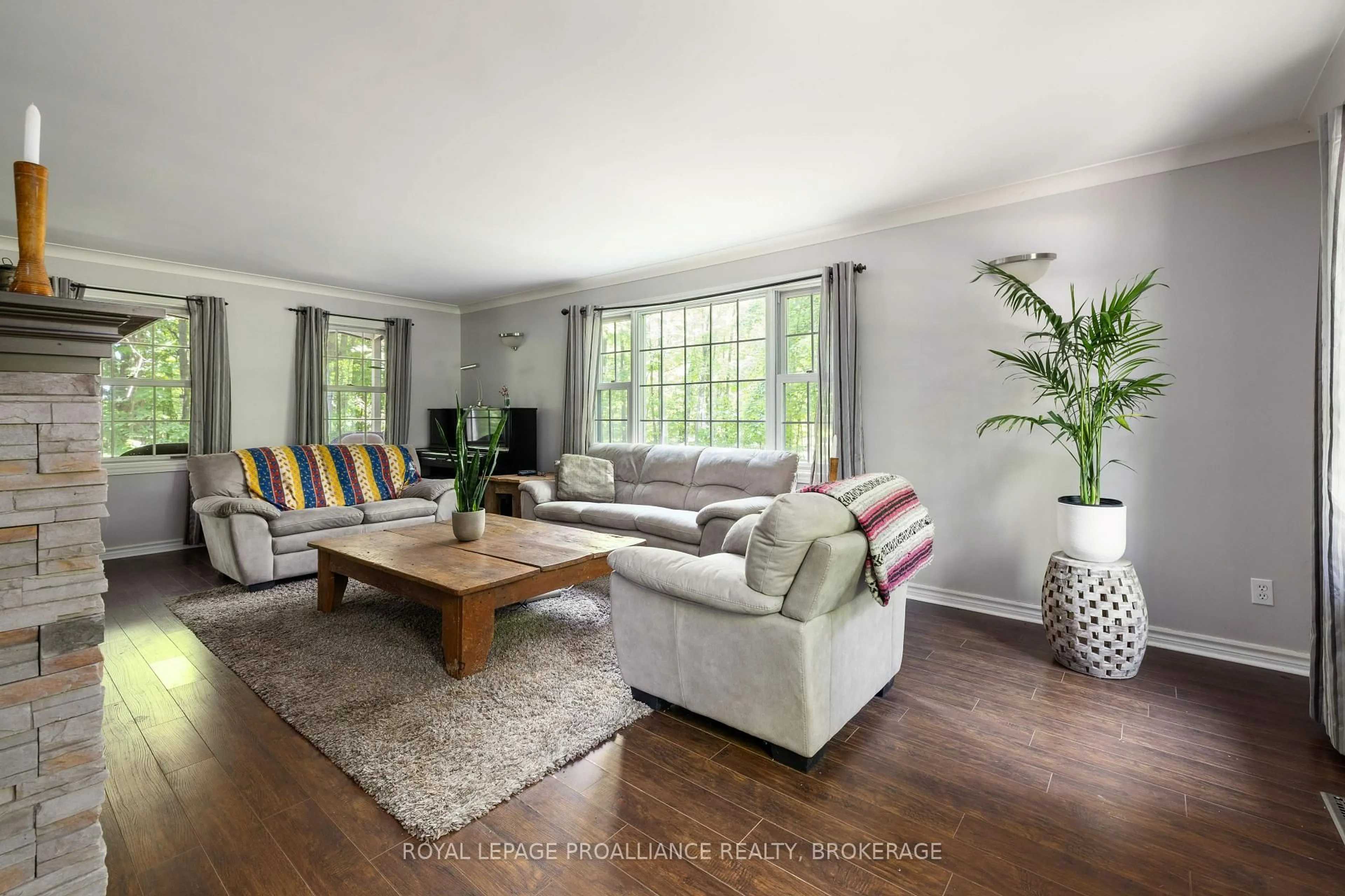 Living room with furniture, wood/laminate floor for 1403 Norway Rd, Perth Road Ontario K0H 2L0