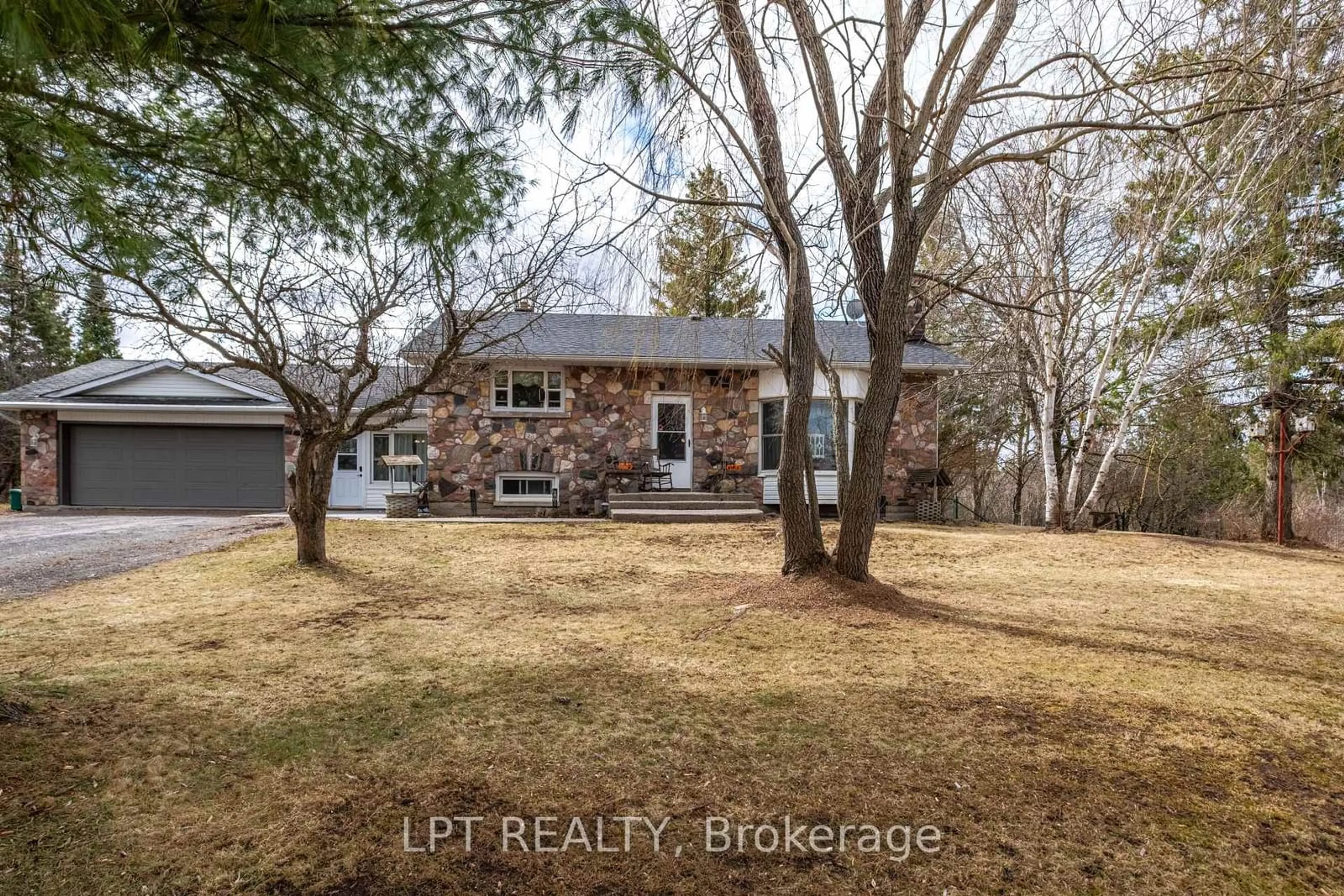 A pic from outside/outdoor area/front of a property/back of a property/a pic from drone, street for 3939 Howes Rd, Bissett Creek Ontario K0H 2H0