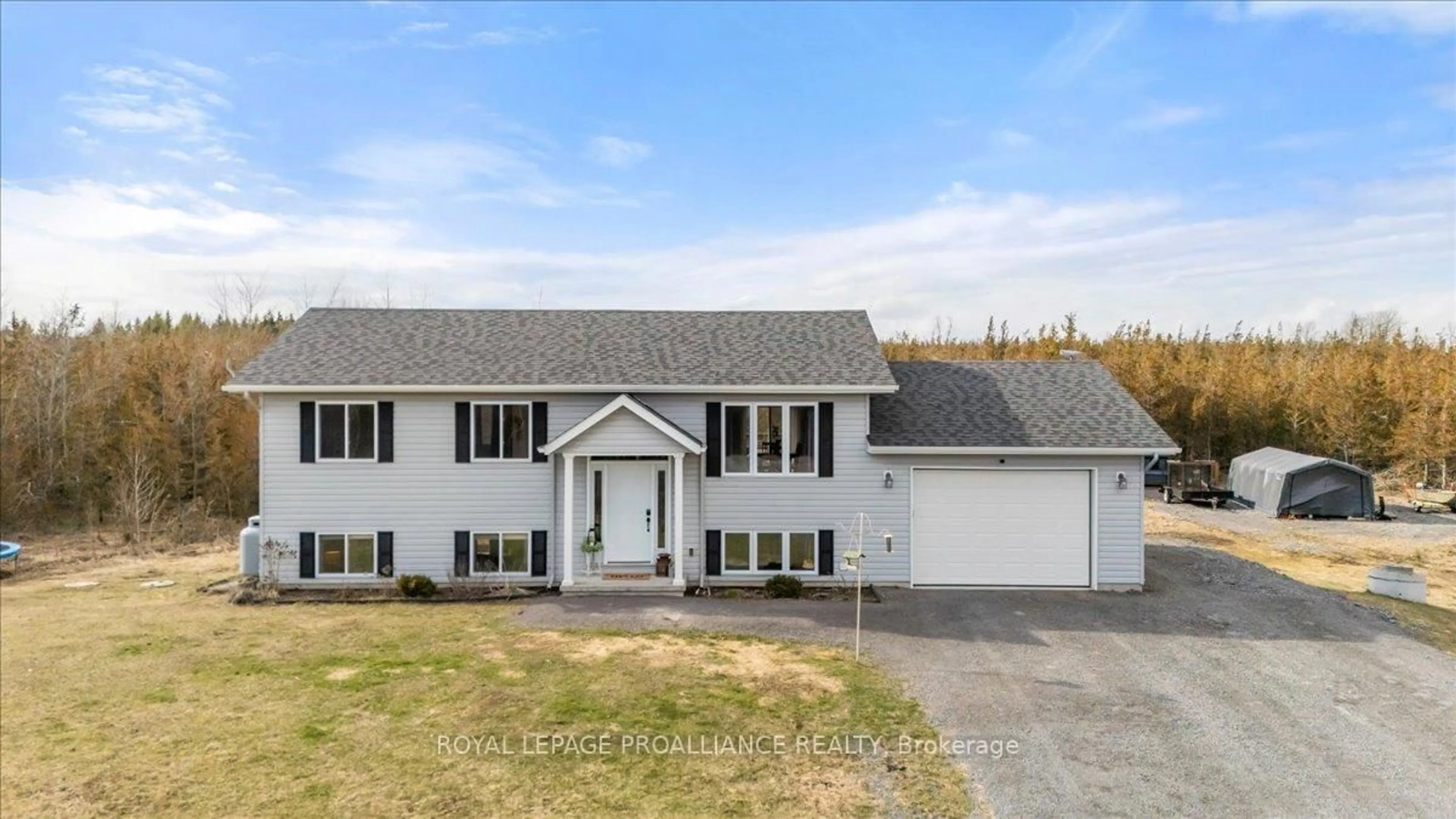 Home with vinyl exterior material, street for 733 Callaghan Rd, Shannonville Ontario K0K 2N0
