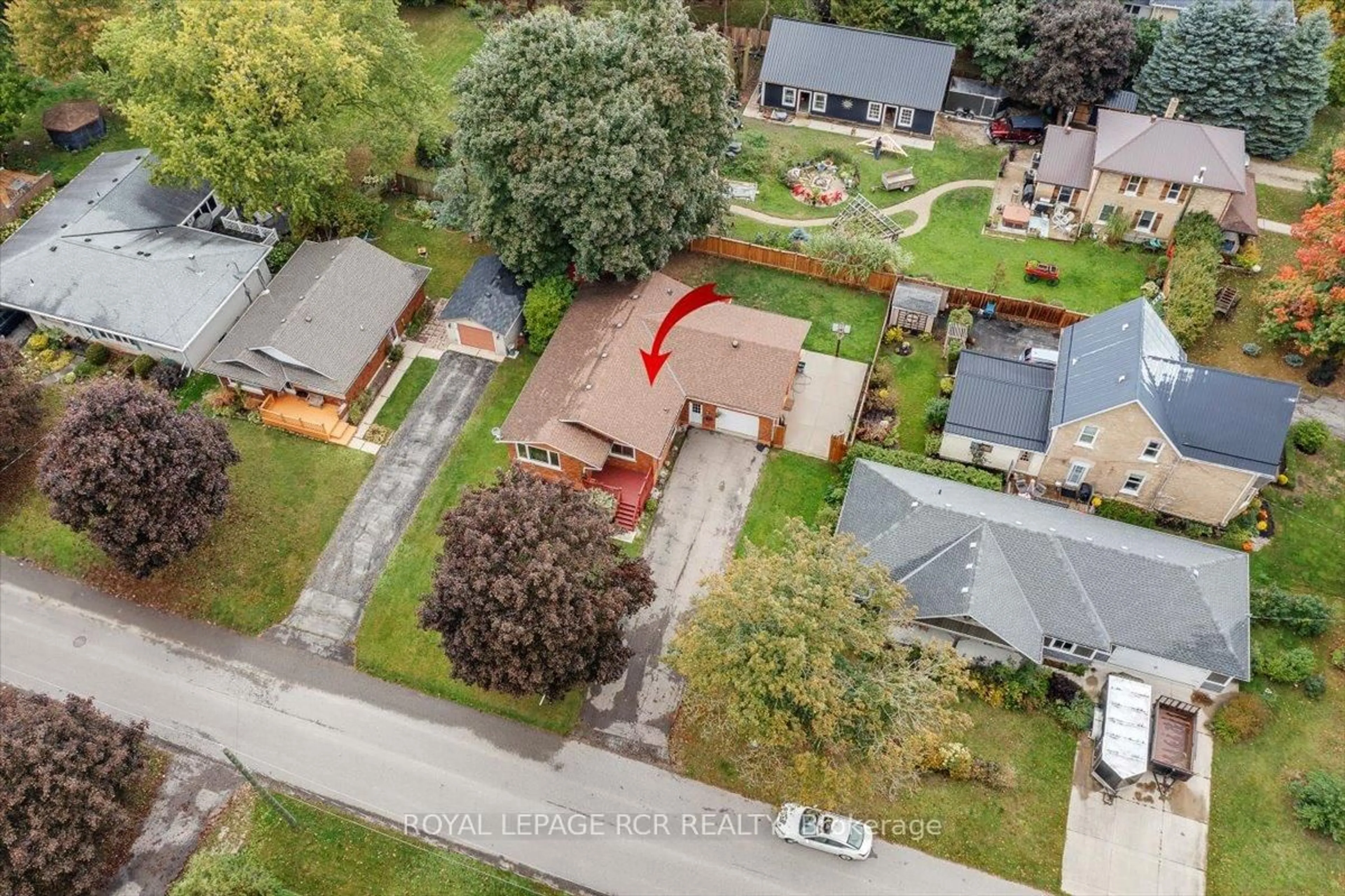 A pic from outside/outdoor area/front of a property/back of a property/a pic from drone, street for 210 Weber St, Wellington North Ontario N0G 2L1