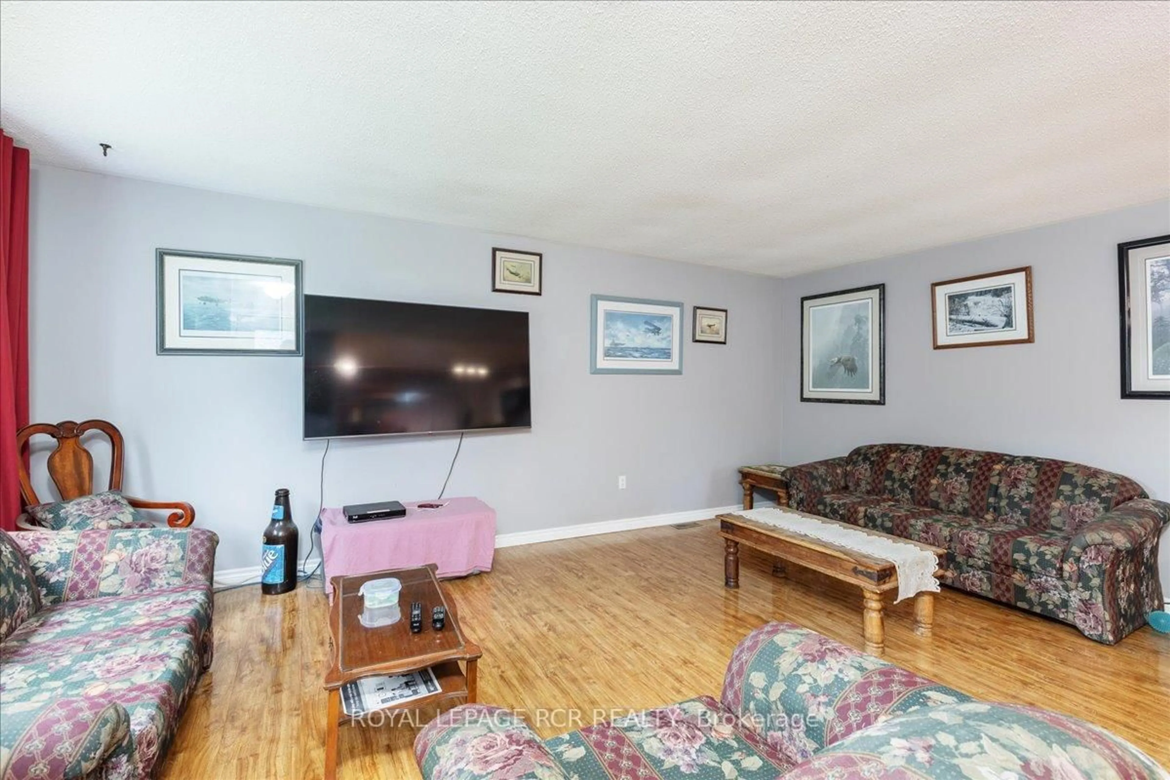 Living room with furniture, wood/laminate floor for 210 Weber St, Wellington North Ontario N0G 2L1
