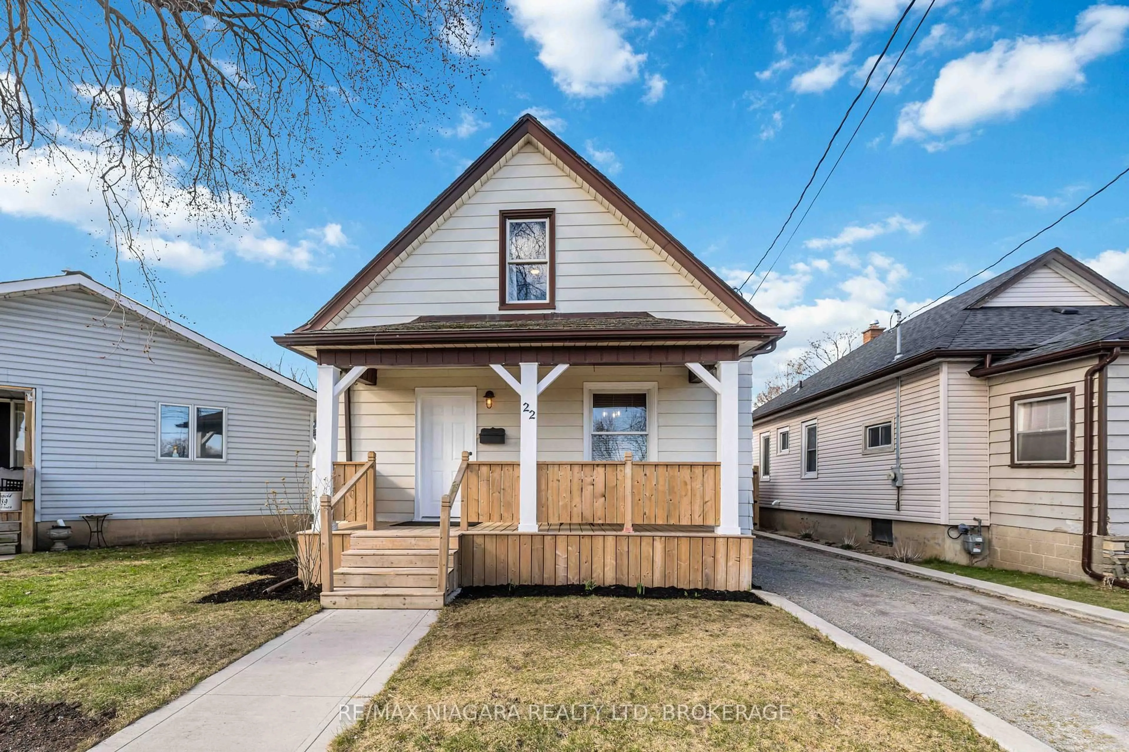 Home with vinyl exterior material, street for 22 Bertram St, St. Catharines Ontario L2R 1A8