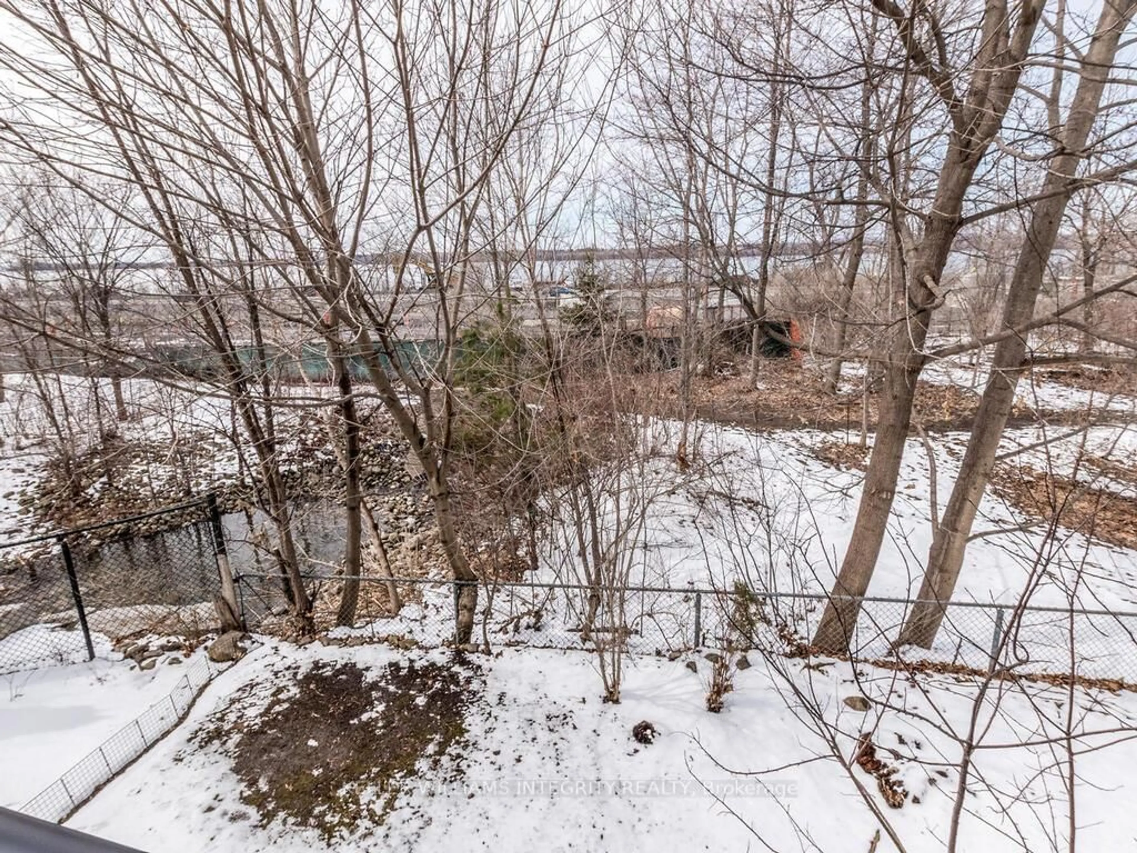 A pic from outside/outdoor area/front of a property/back of a property/a pic from drone, forest/trees view for 655 Richmond Rd #27, Ottawa Ontario K2A 3Y3