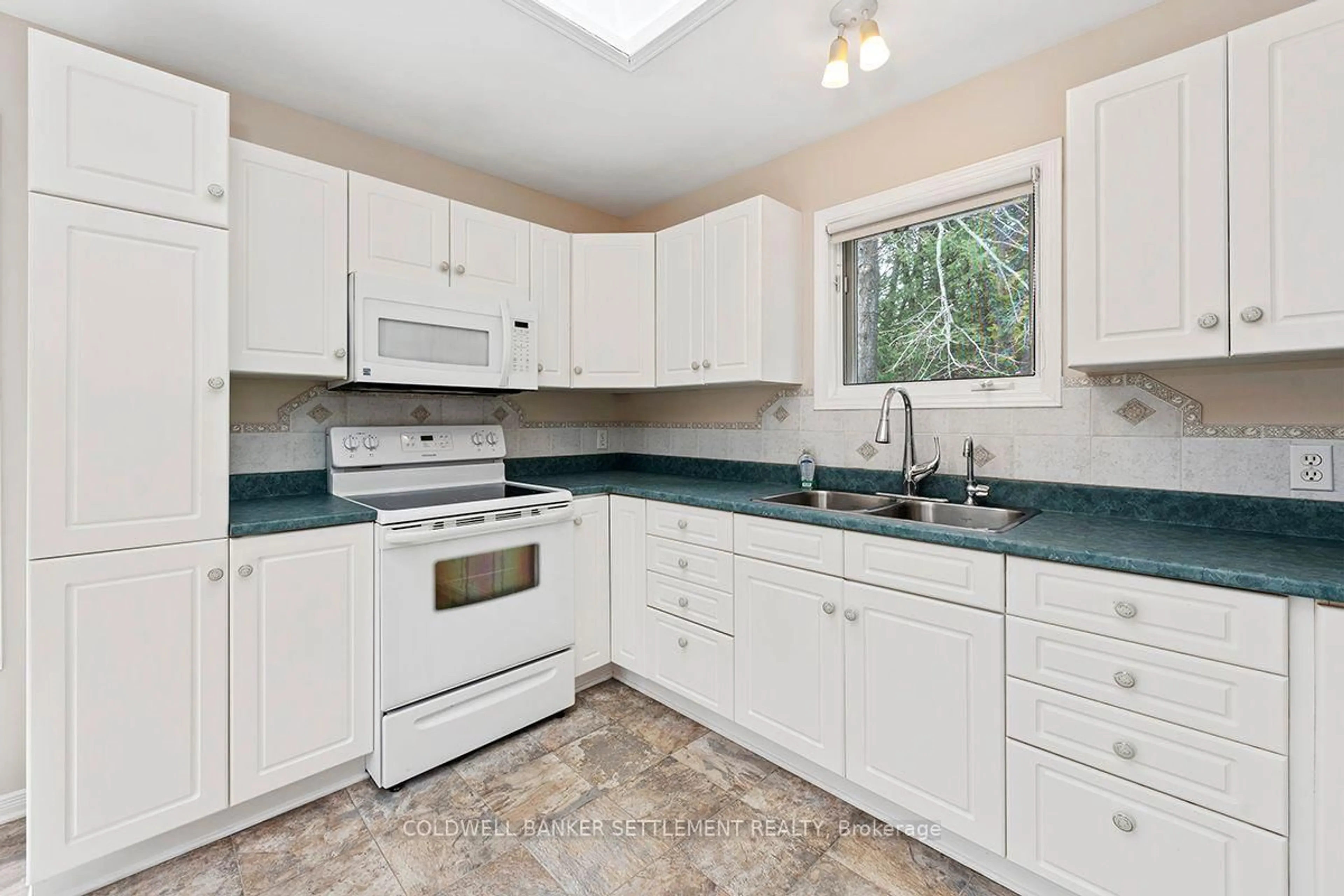Standard kitchen, ceramic/tile floor for 64 B7 Rd, Rideau Lakes Ontario K0G 1L0