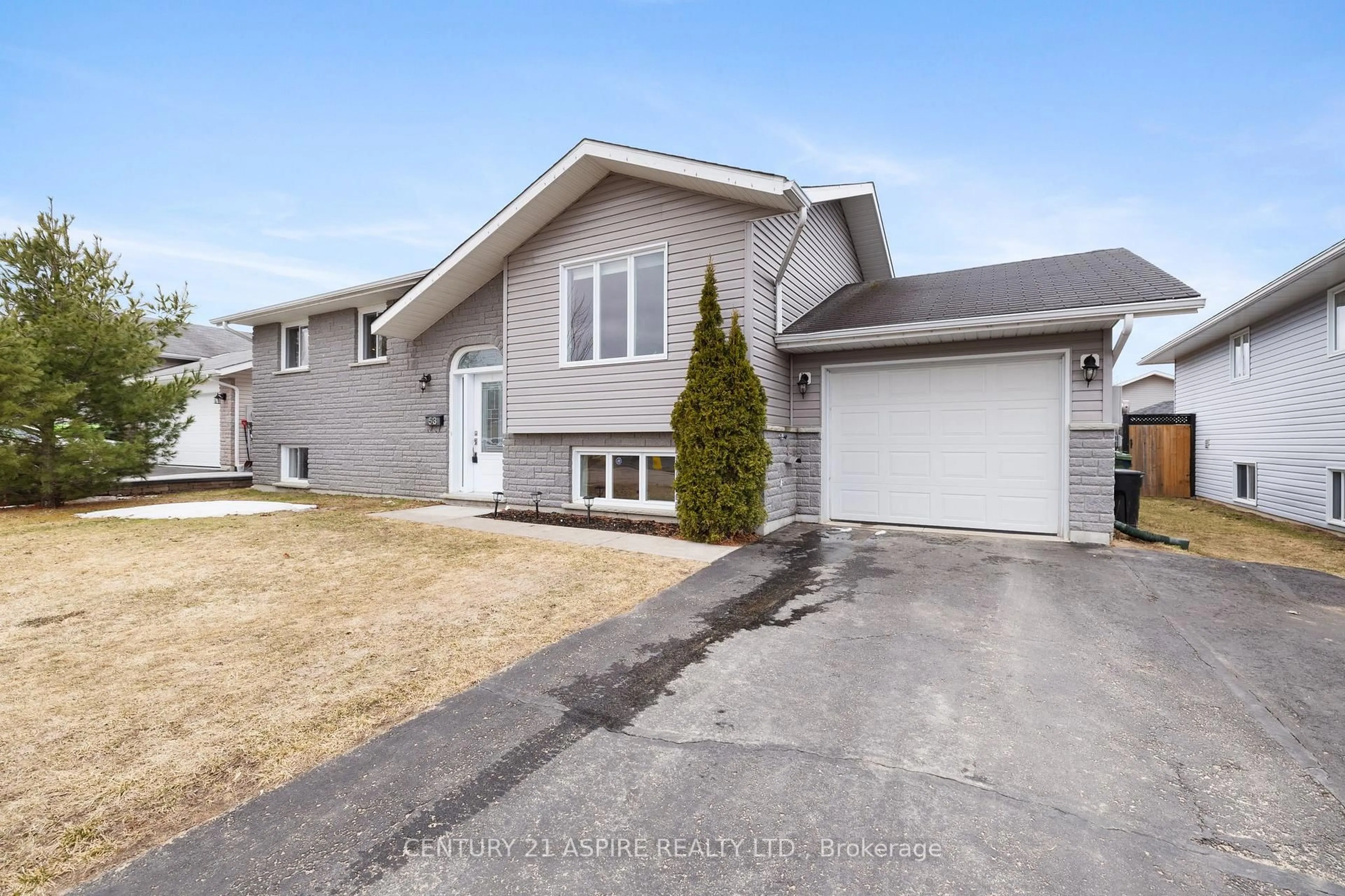 Home with vinyl exterior material, street for 53 Spruce St, Petawawa Ontario K8H 3S4