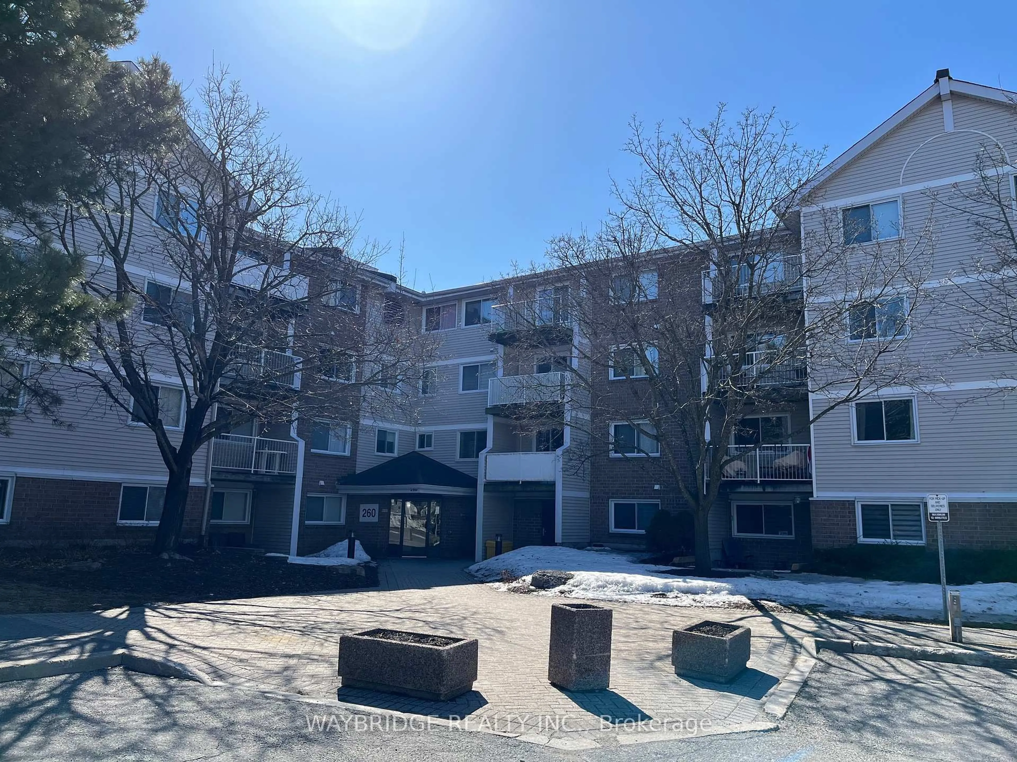 A pic from outside/outdoor area/front of a property/back of a property/a pic from drone, unknown for 260 Brittany Dr #406, Ottawa Ontario K1K 4M2