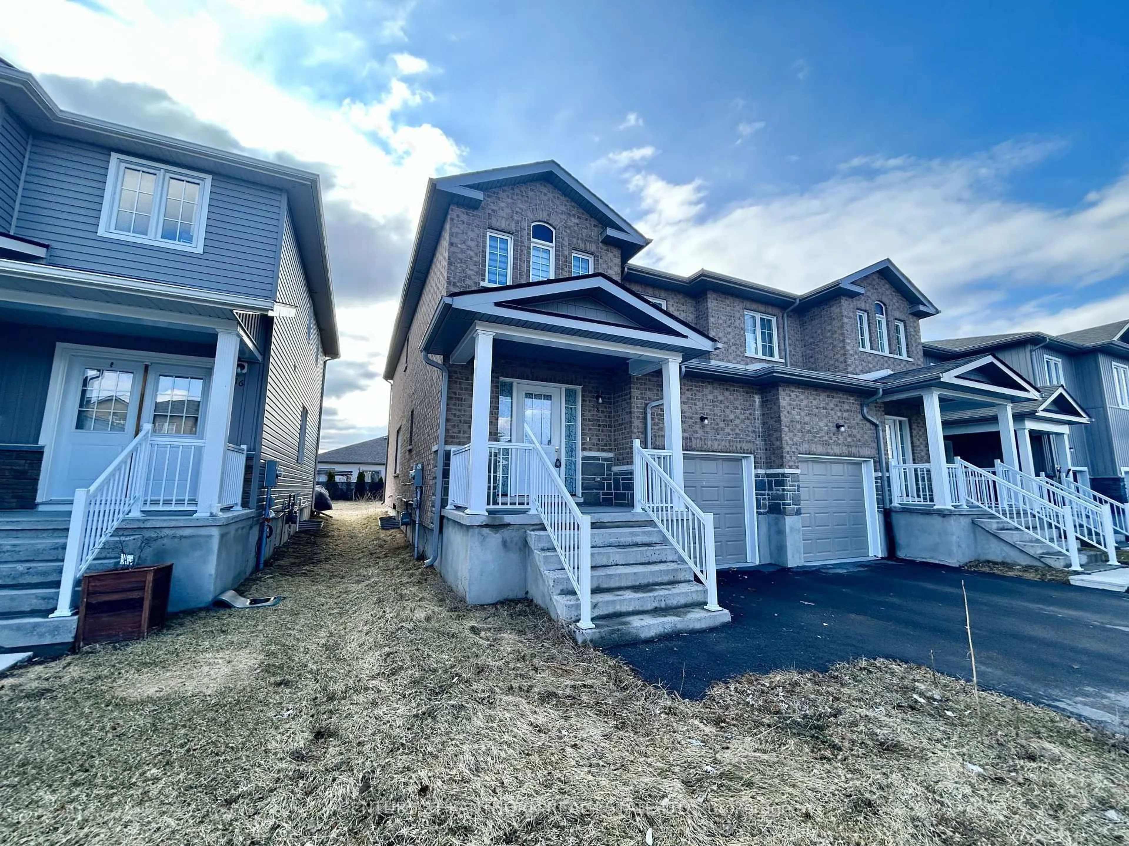 A pic from outside/outdoor area/front of a property/back of a property/a pic from drone, street for 18 Tegan Crt, Bissett Creek Ontario K0H 2H0