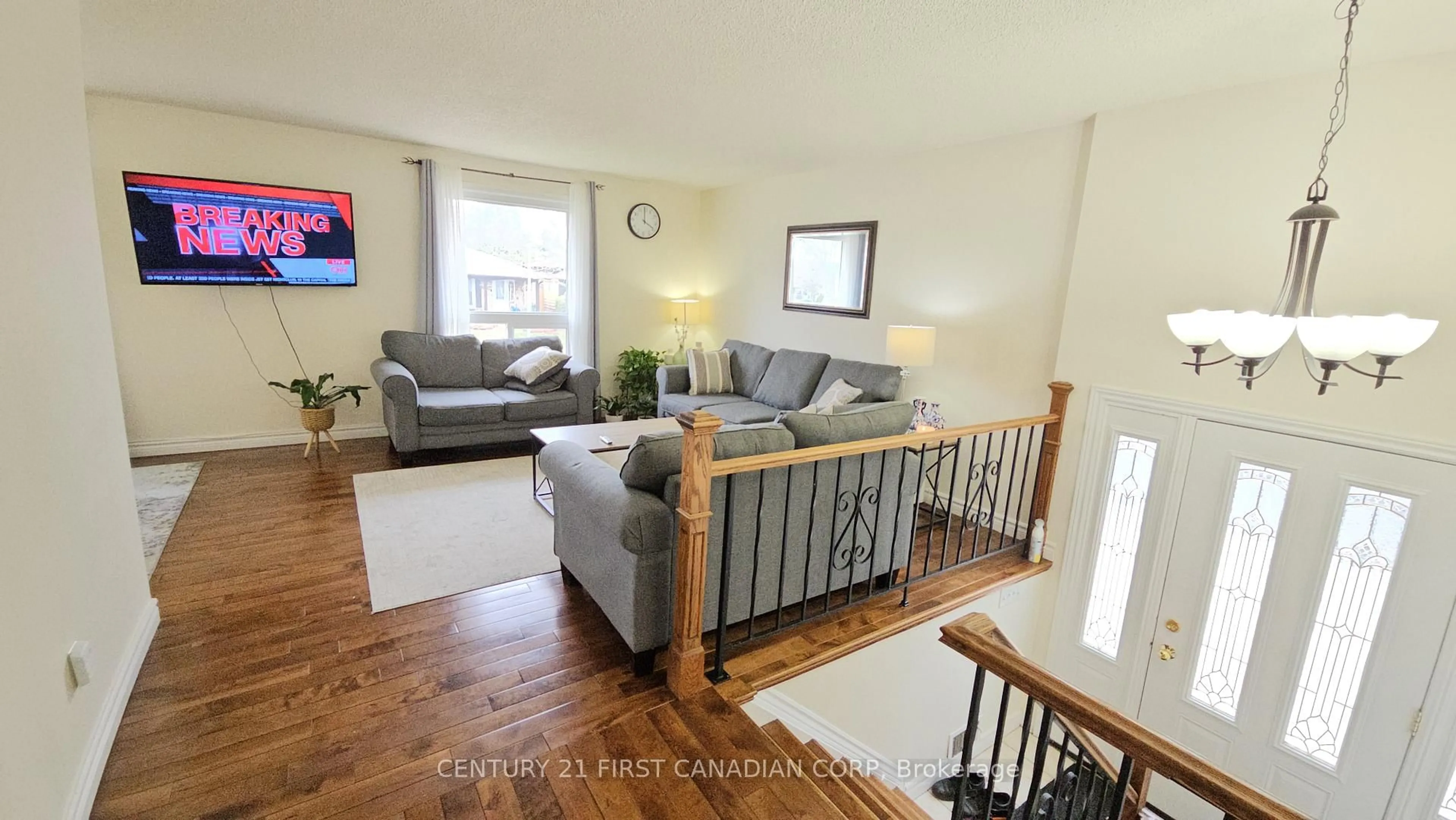 Living room with furniture, wood/laminate floor for 45 Locust Cres, London Ontario N6E 2K1