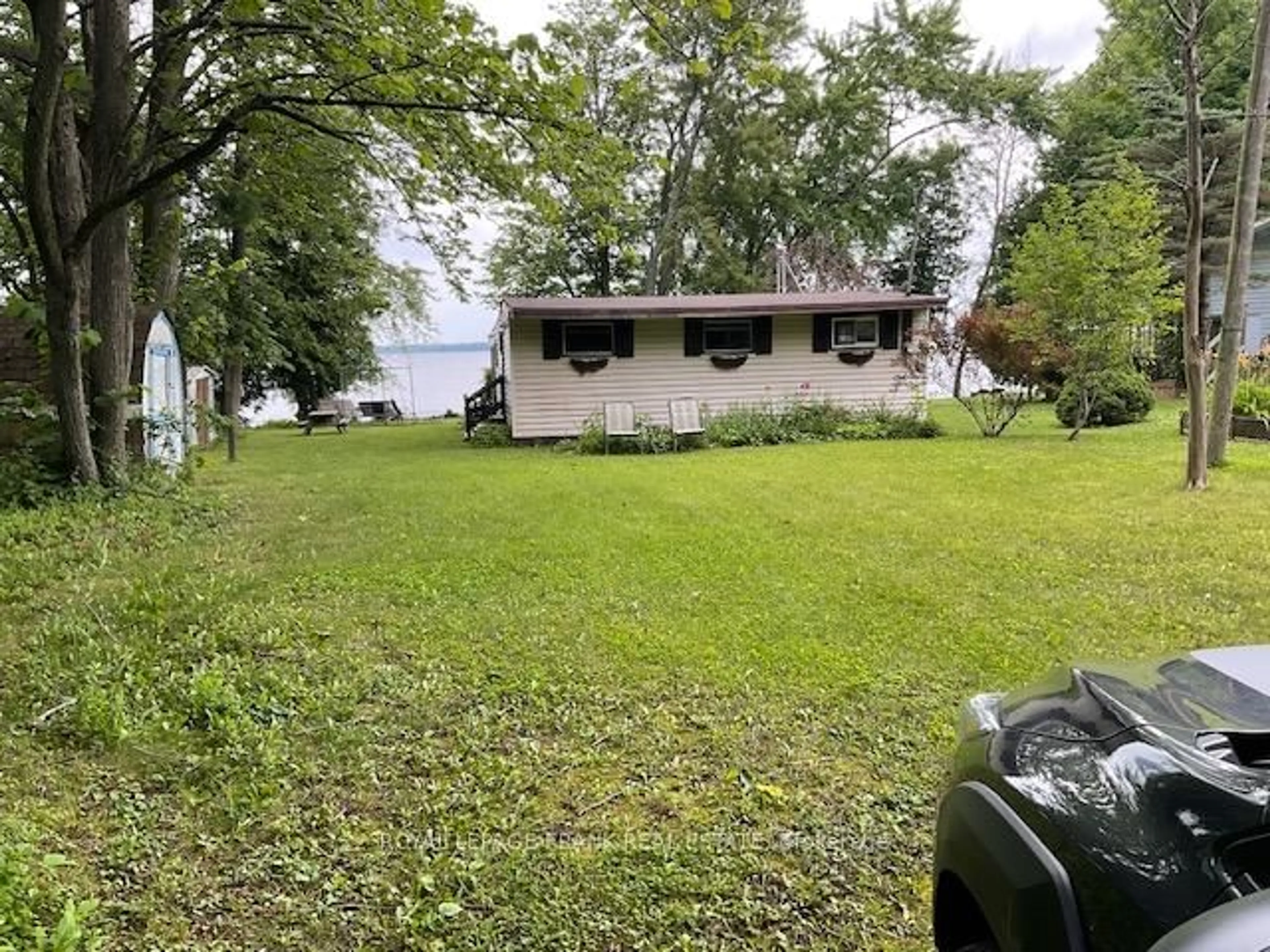 A pic from outside/outdoor area/front of a property/back of a property/a pic from drone, water/lake/river/ocean view for 16 Caline Rd, Curve Lake First Nation 35 Ontario K0L 2H0
