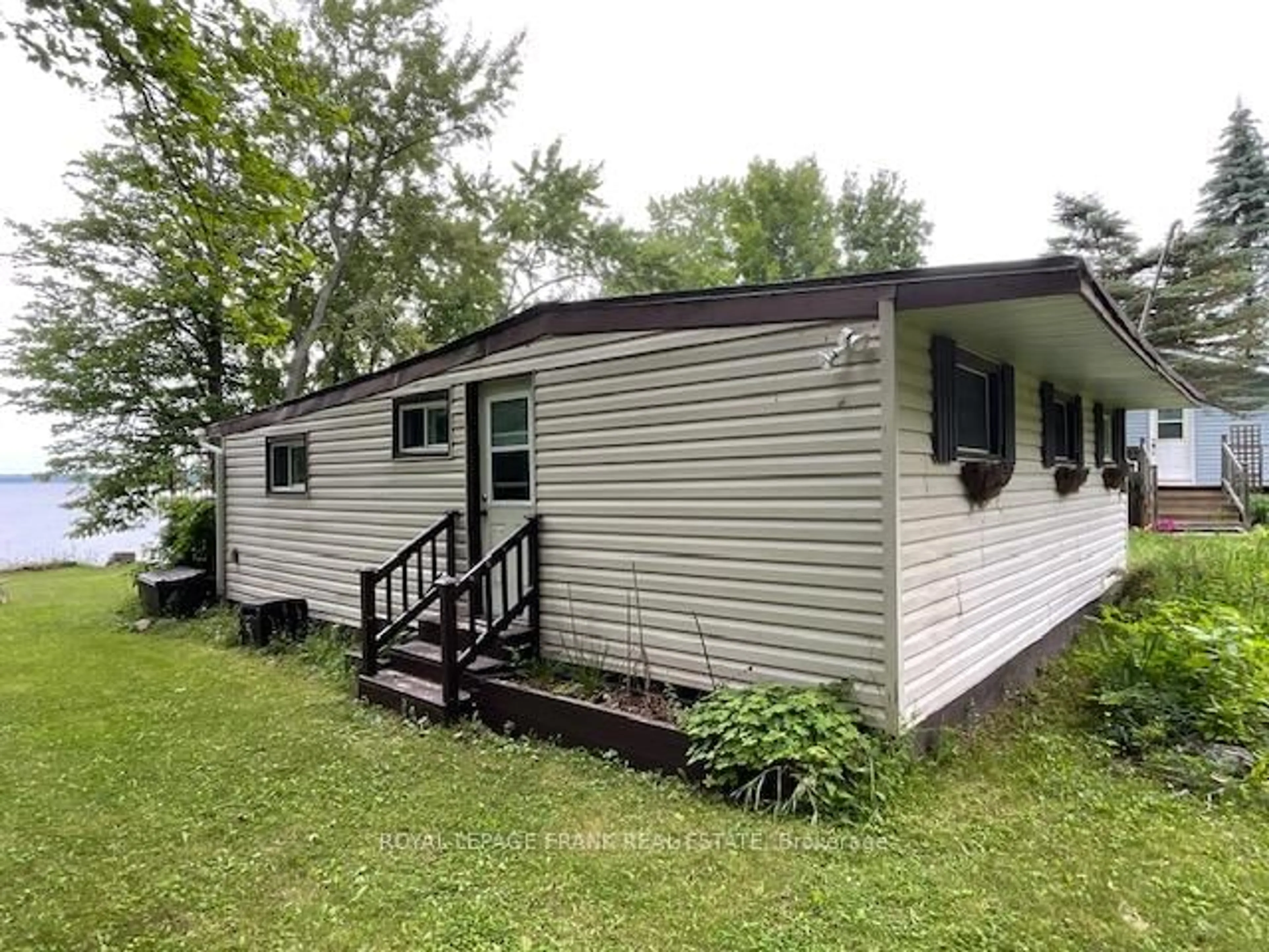 Home with vinyl exterior material, unknown for 16 Caline Rd, Curve Lake First Nation 35 Ontario K0L 2H0