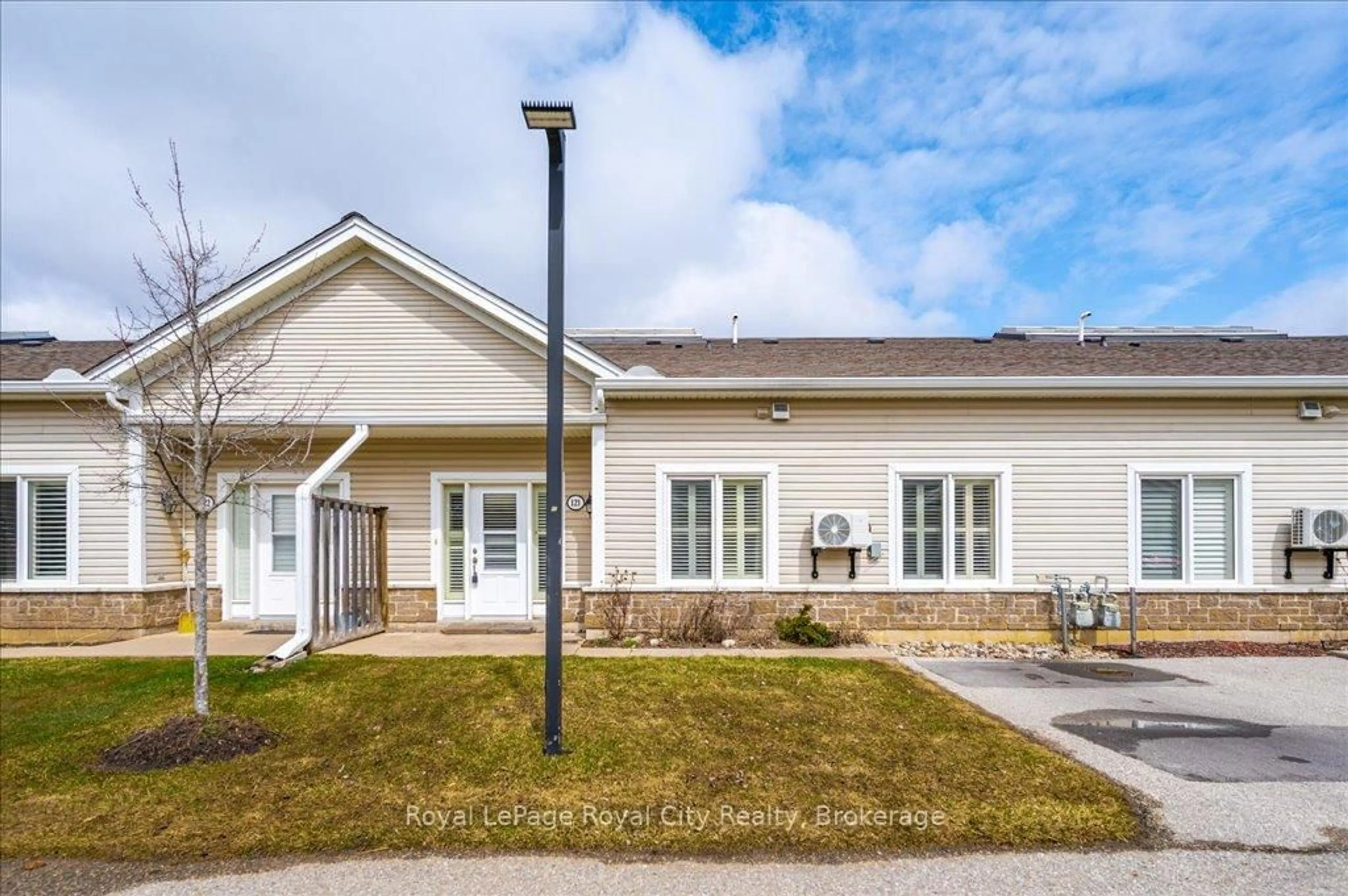Home with vinyl exterior material, street for 760 Woodhill Dr #121, Centre Wellington Ontario N1M 3W5