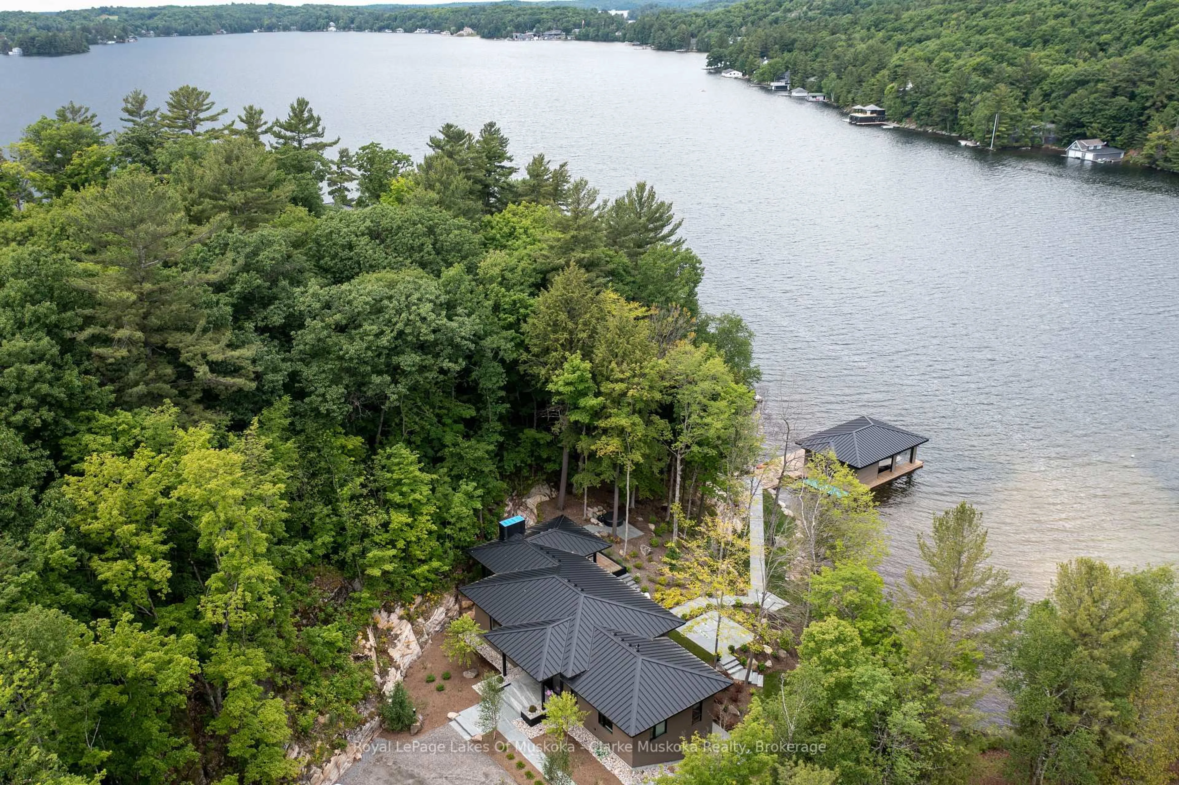 A pic from outside/outdoor area/front of a property/back of a property/a pic from drone, water/lake/river/ocean view for 3864 MUSKOKA RD 118W N/A #3, Muskoka Lakes Ontario P0B 1J0