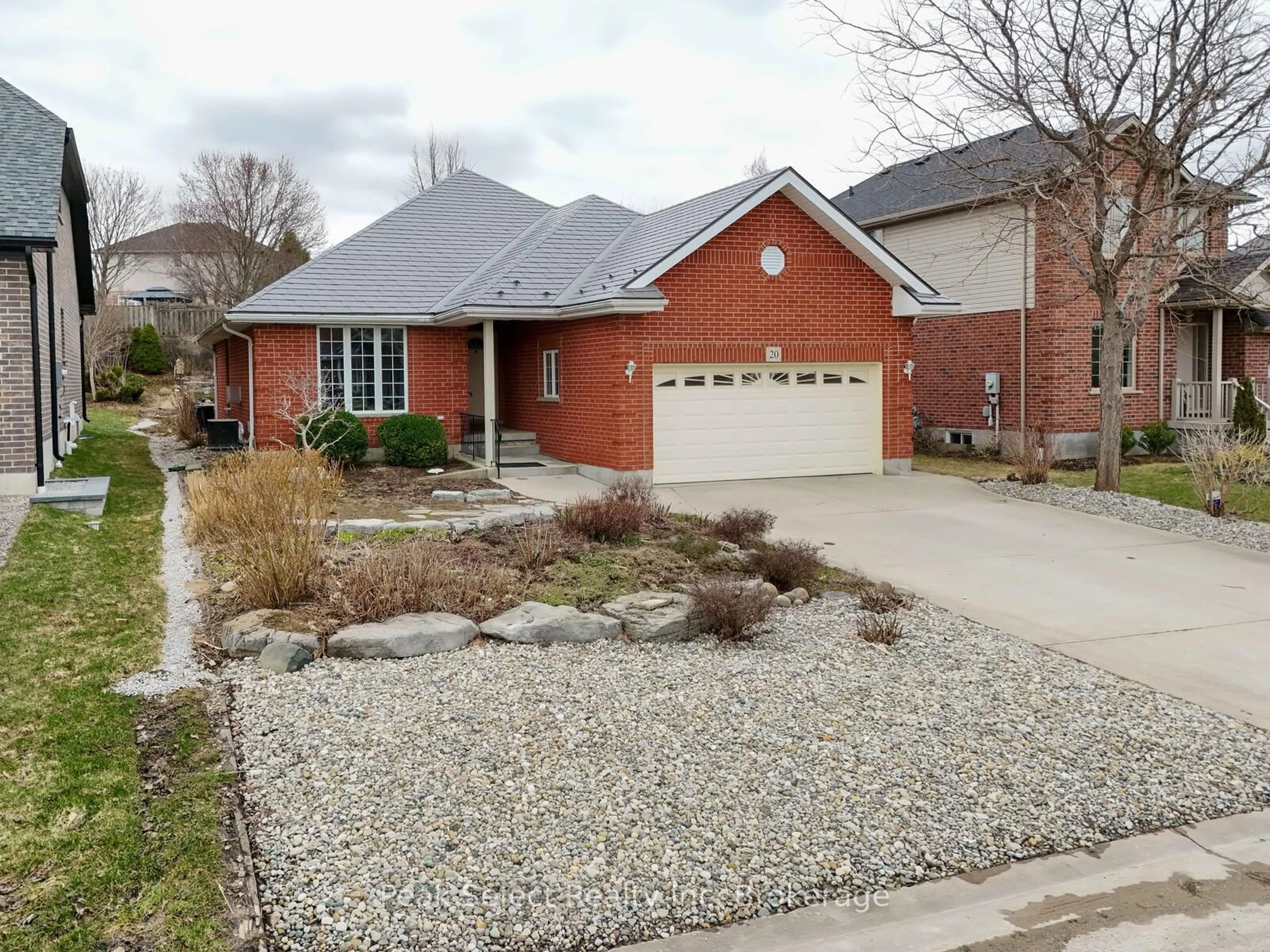 Home with brick exterior material, street for 20 Ridgewood Cres, St. Marys Ontario N4X 1E8