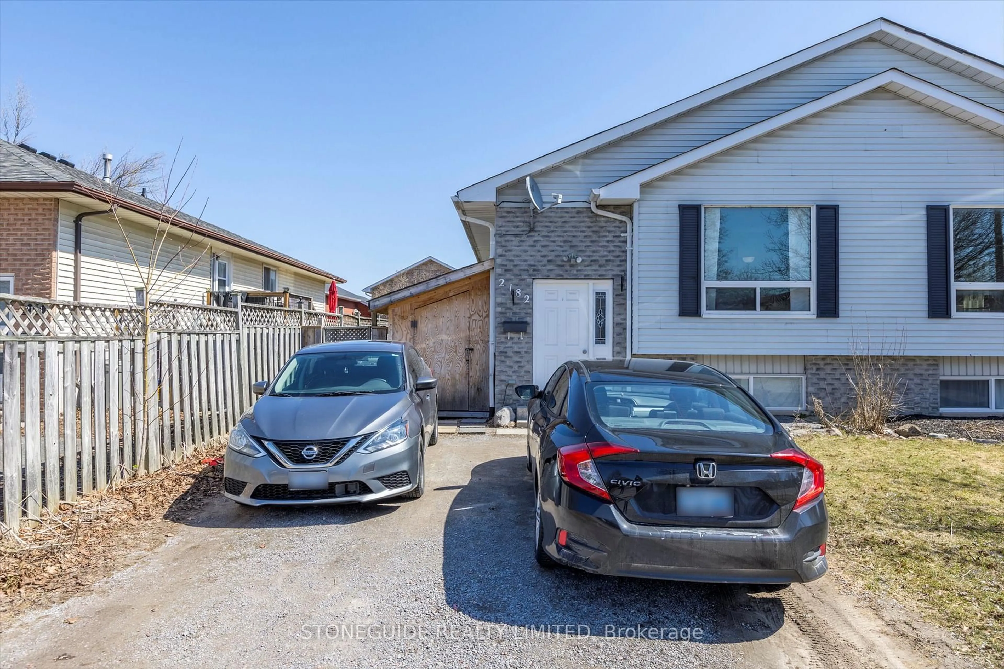A pic from outside/outdoor area/front of a property/back of a property/a pic from drone, street for 2182 Easthill Dr, Peterborough Ontario K9L 1X3