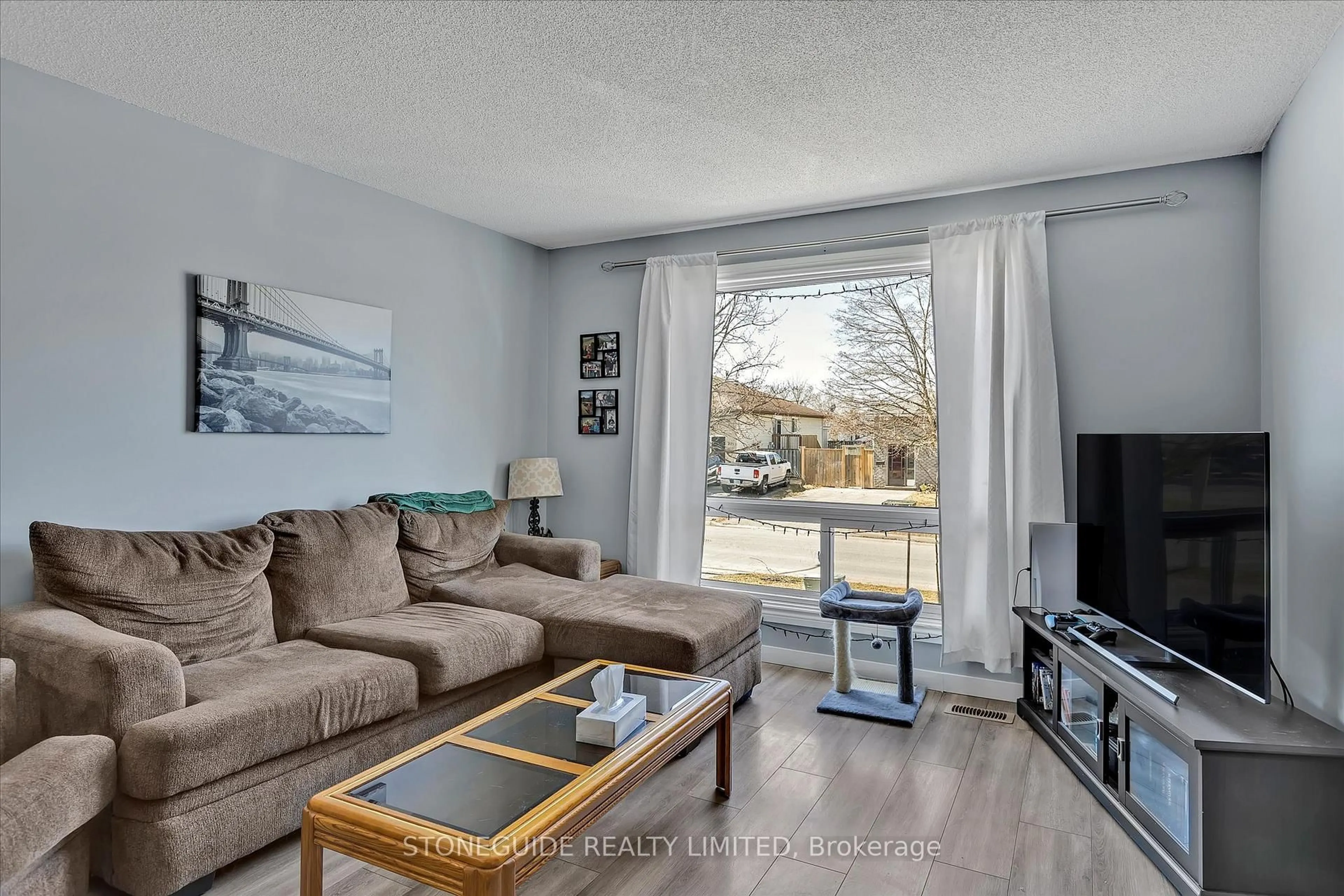 Living room with furniture, unknown for 2182 Easthill Dr, Peterborough Ontario K9L 1X3