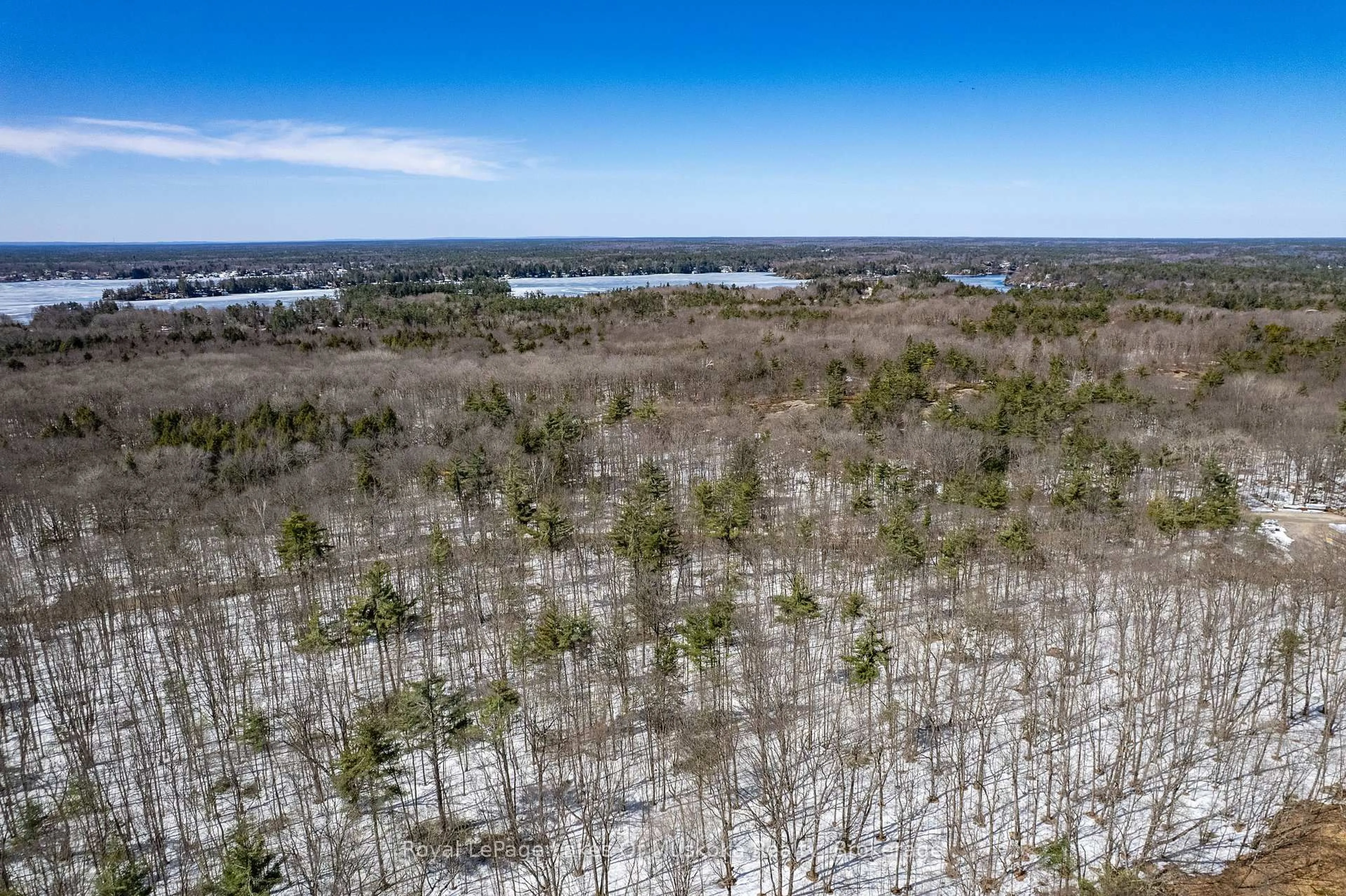 A pic from outside/outdoor area/front of a property/back of a property/a pic from drone, water/lake/river/ocean view for 200 Tiffany Tr, Gravenhurst Ontario P1P 1A6