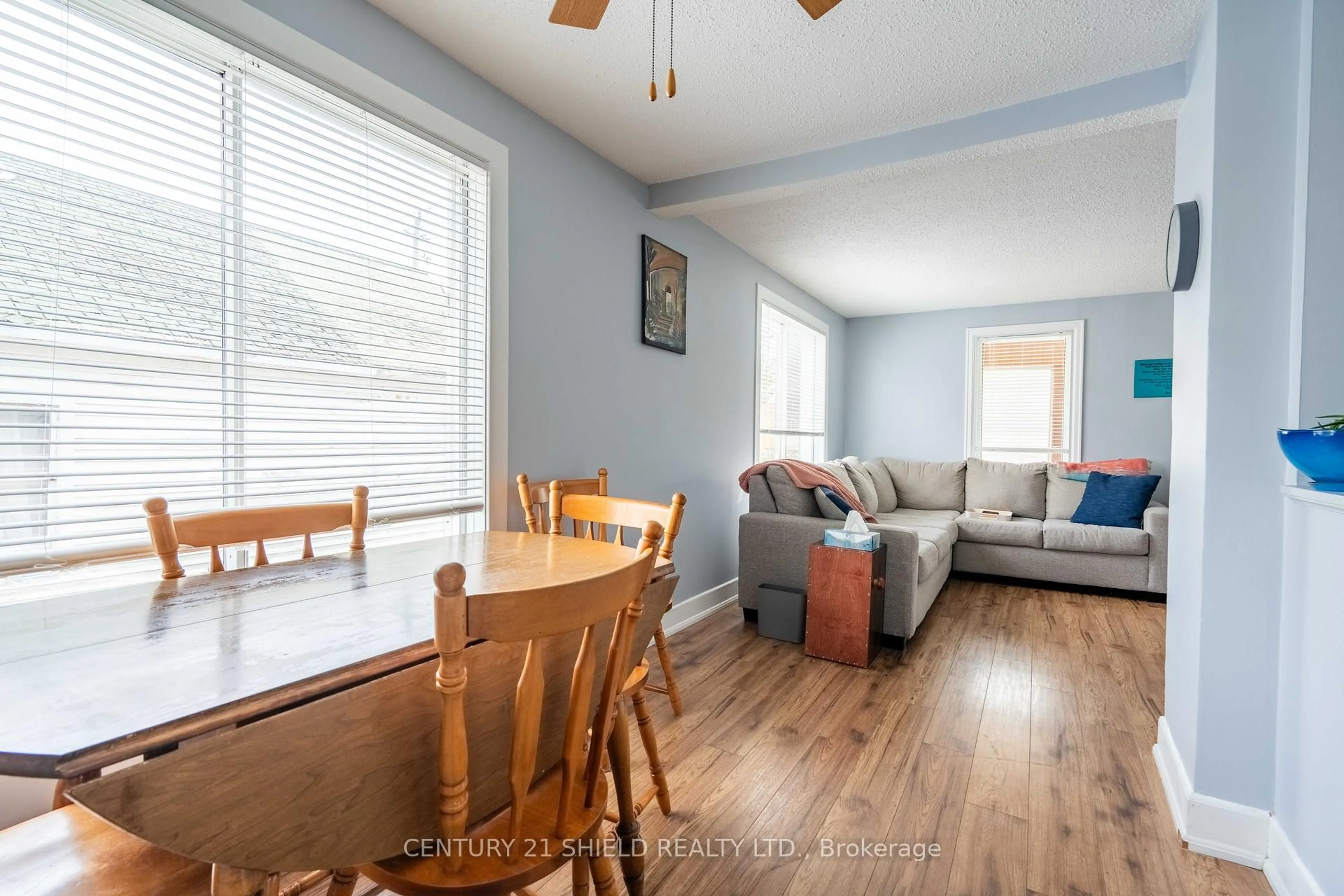 Living room with furniture, wood/laminate floor for 31 5th St, Cornwall Ontario K6J 2T5
