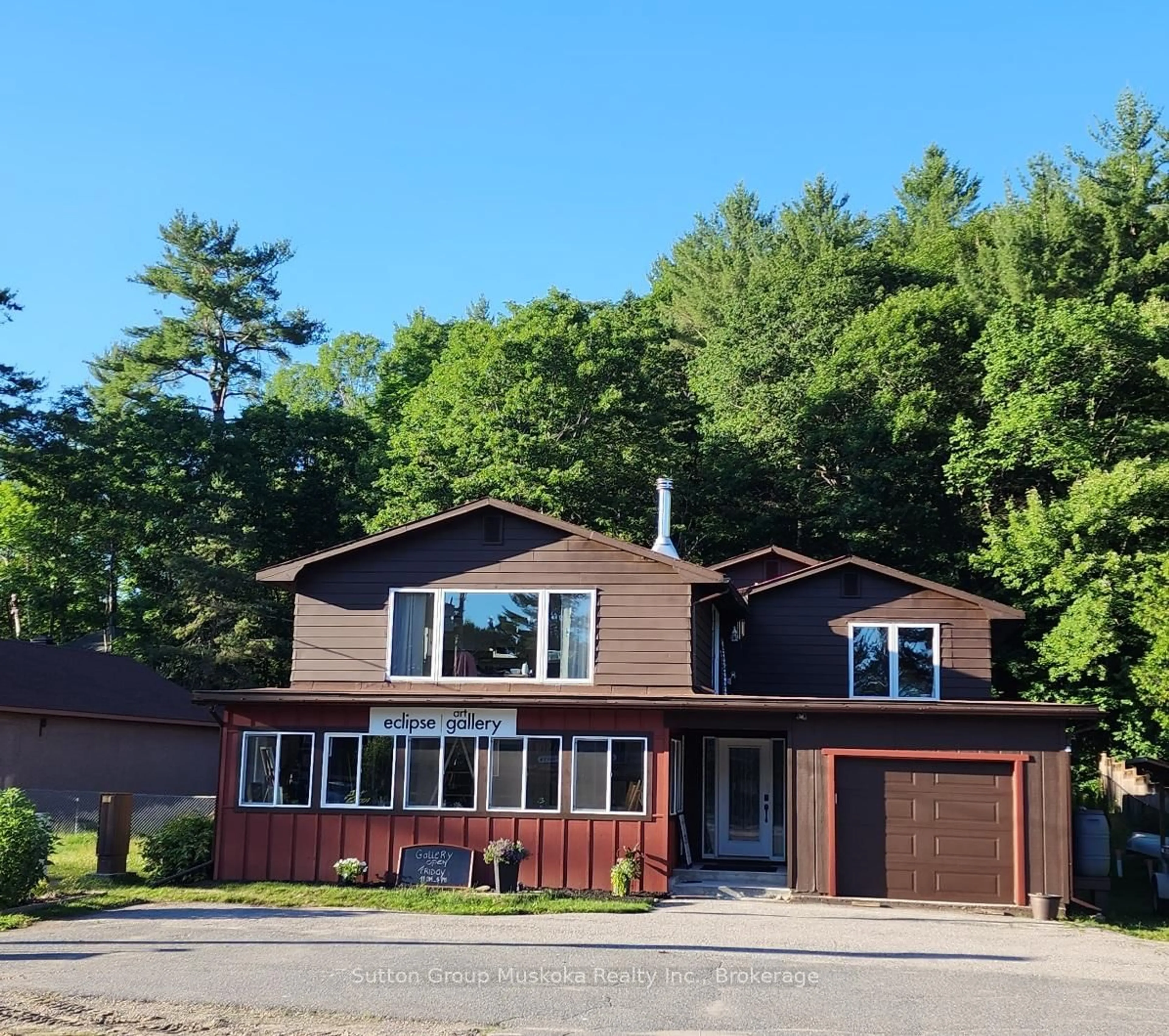 Home with vinyl exterior material, street for 2831 Highway 60 Highway, Lake of Bays Ontario P0A 1H0