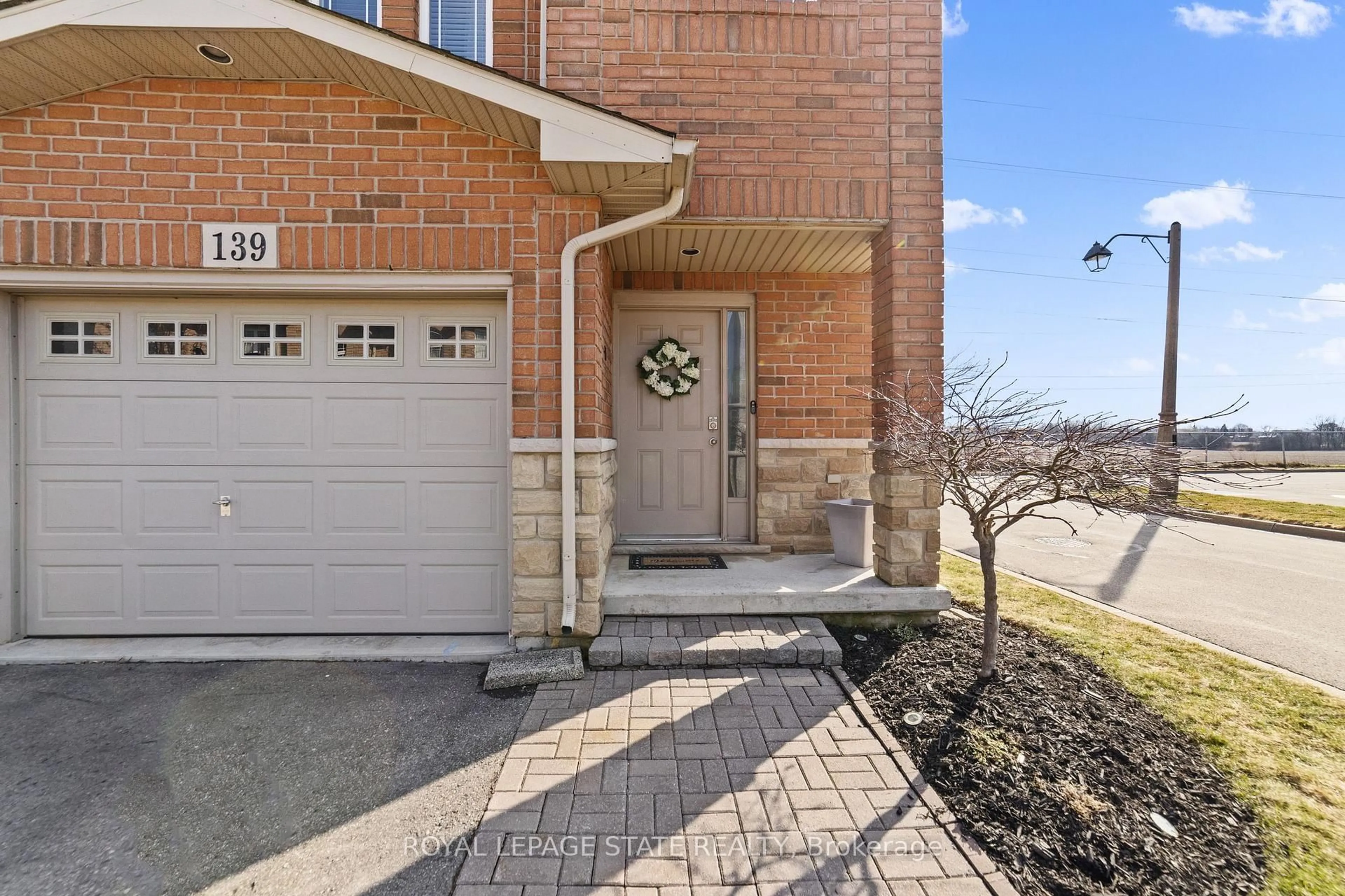 Home with brick exterior material, street for 139 Periwinkle Dr, Hamilton Ontario L0R 1P0