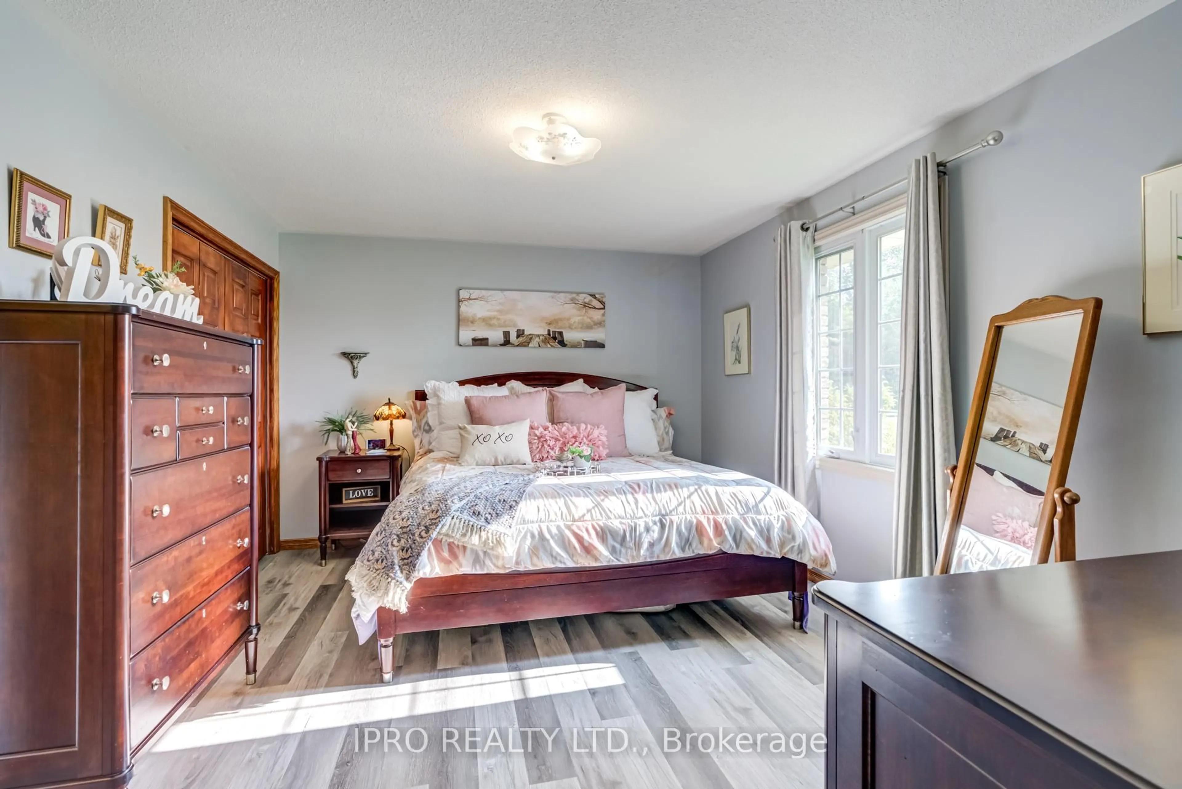 Bedroom with bed, wood/laminate floor for 333424 Concession 1 RR4 N/A, West Grey Ontario N0G 1R0