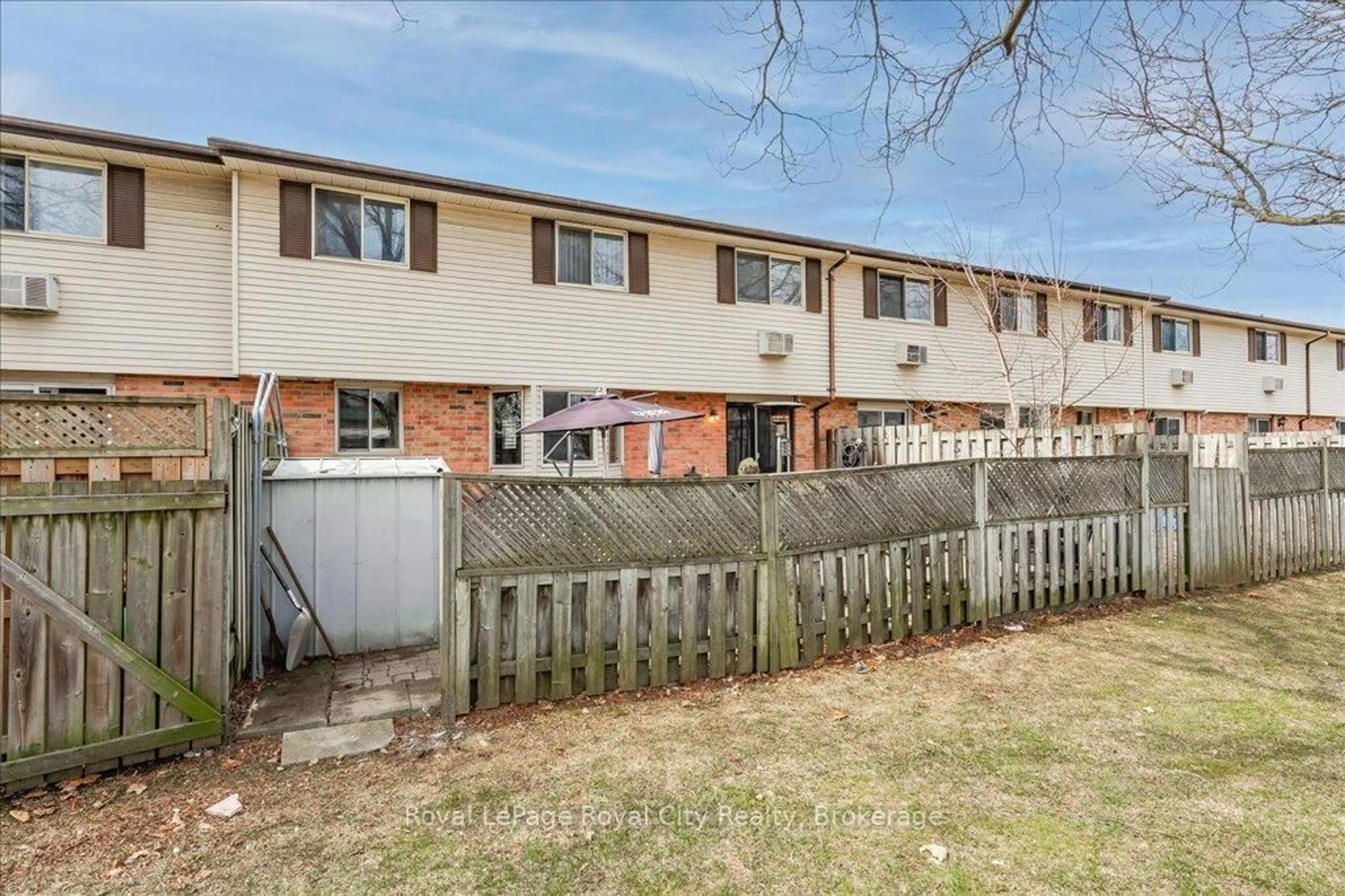 A pic from outside/outdoor area/front of a property/back of a property/a pic from drone, street for 40 Silvercreek Pkwy #2, Guelph Ontario N1H 7X5