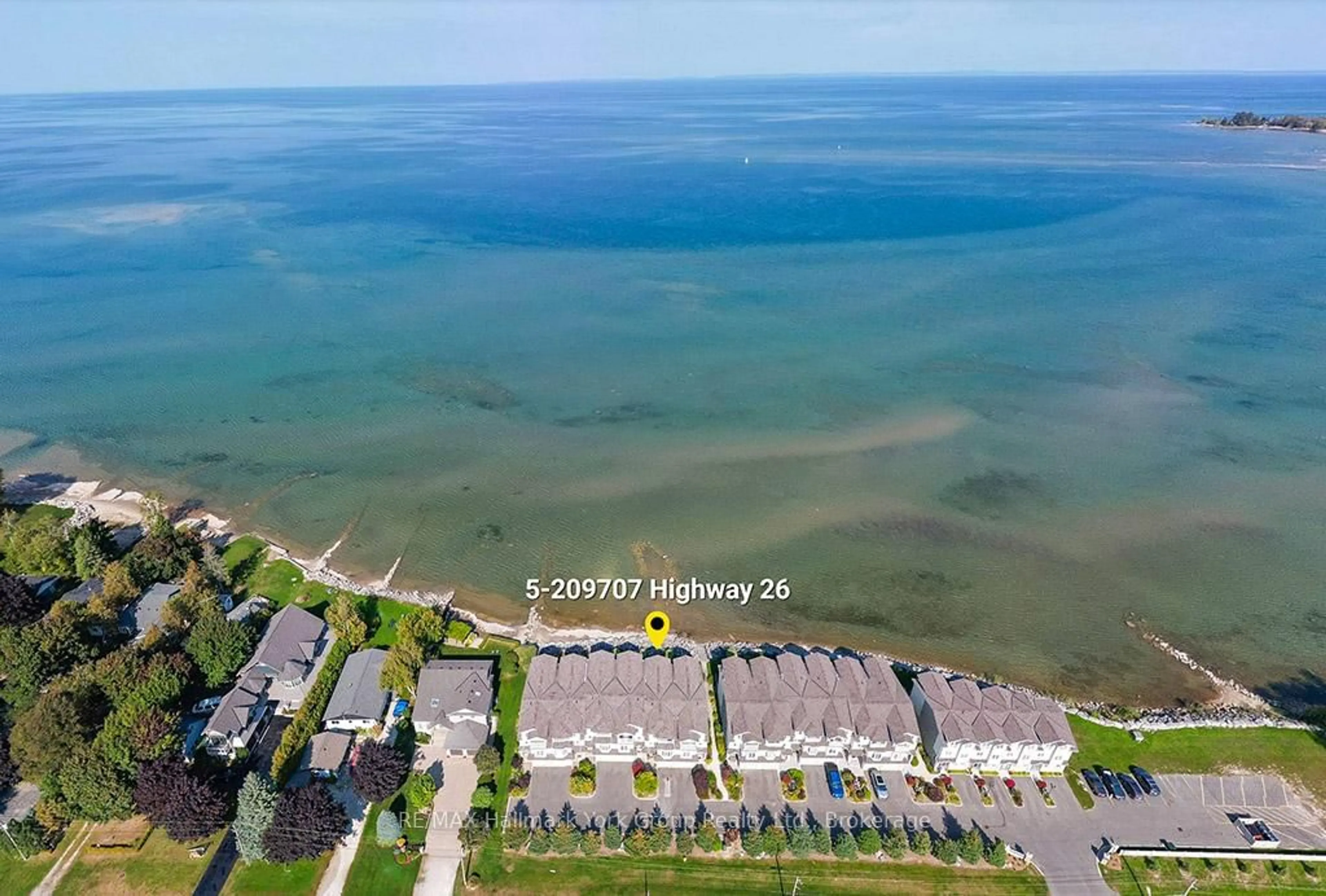 A pic from outside/outdoor area/front of a property/back of a property/a pic from drone, water/lake/river/ocean view for 209707 HWY 26 N/A #5, Blue Mountains Ontario L9Y 0T8