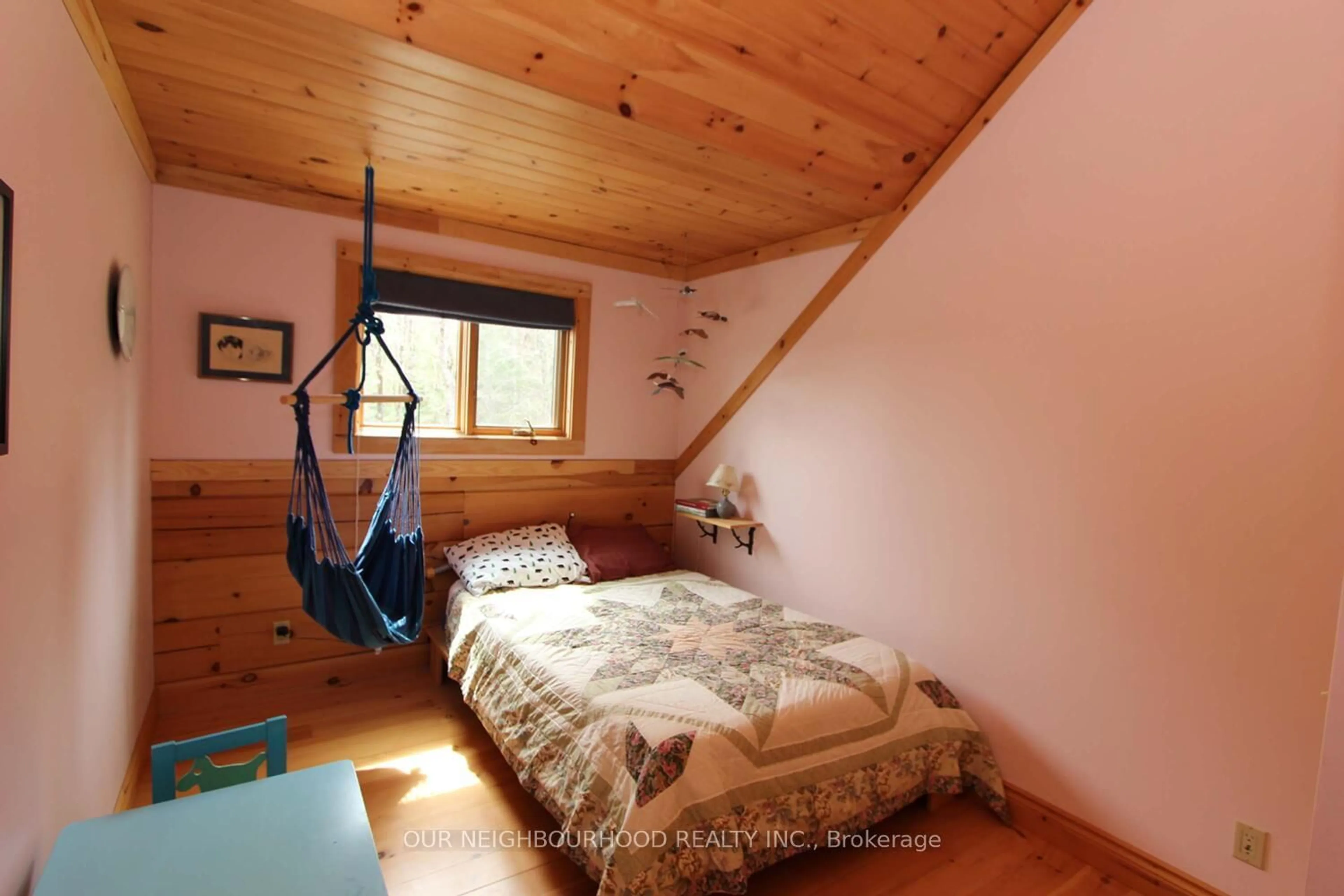 Bedroom with bed, wood/laminate floor for 277 Lake Tangamong, Limoges Ontario K0K 2M0